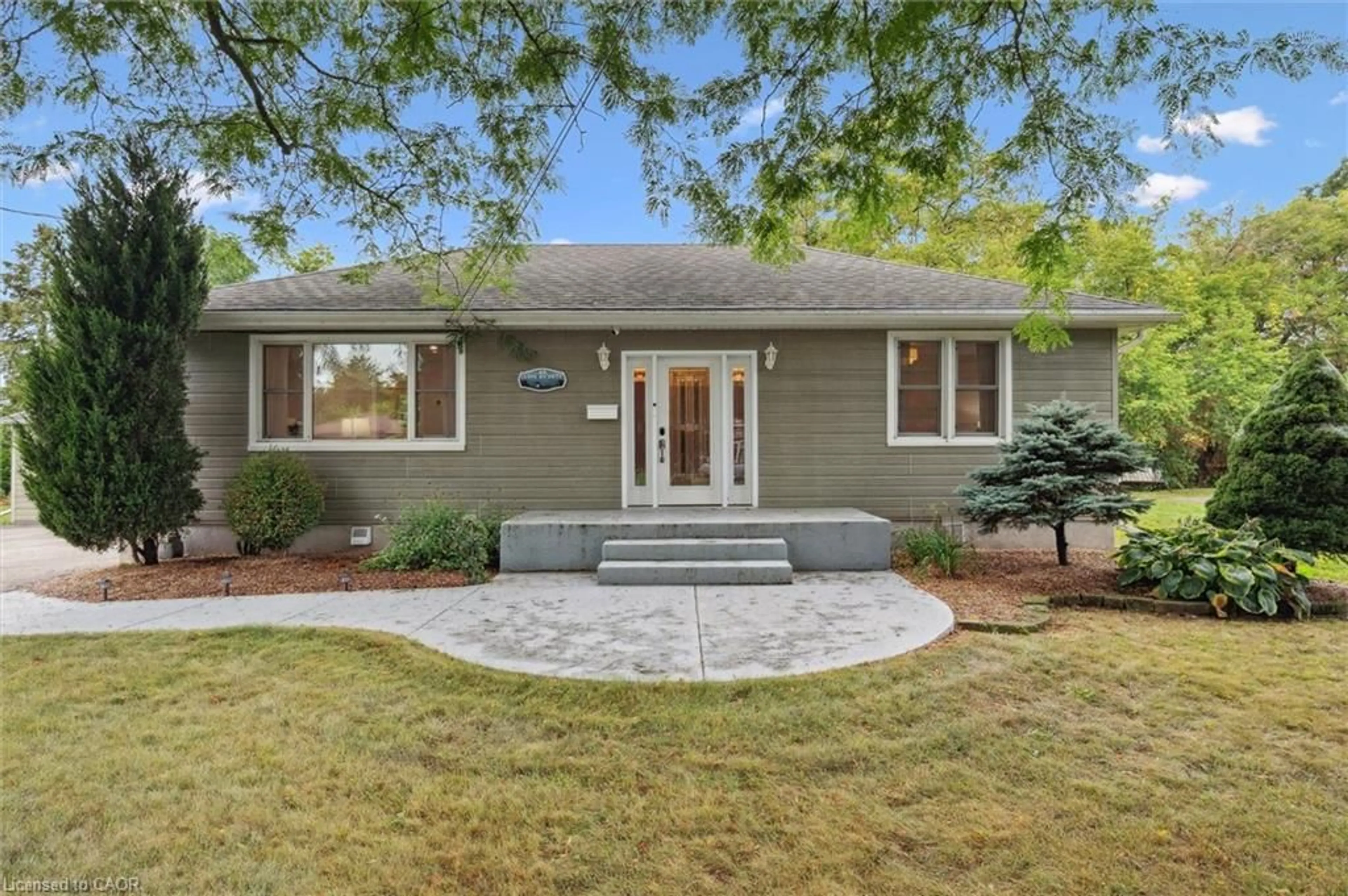 Home with brick exterior material, street for 48 Curtis Ave, Paris Ontario N3L 3J7