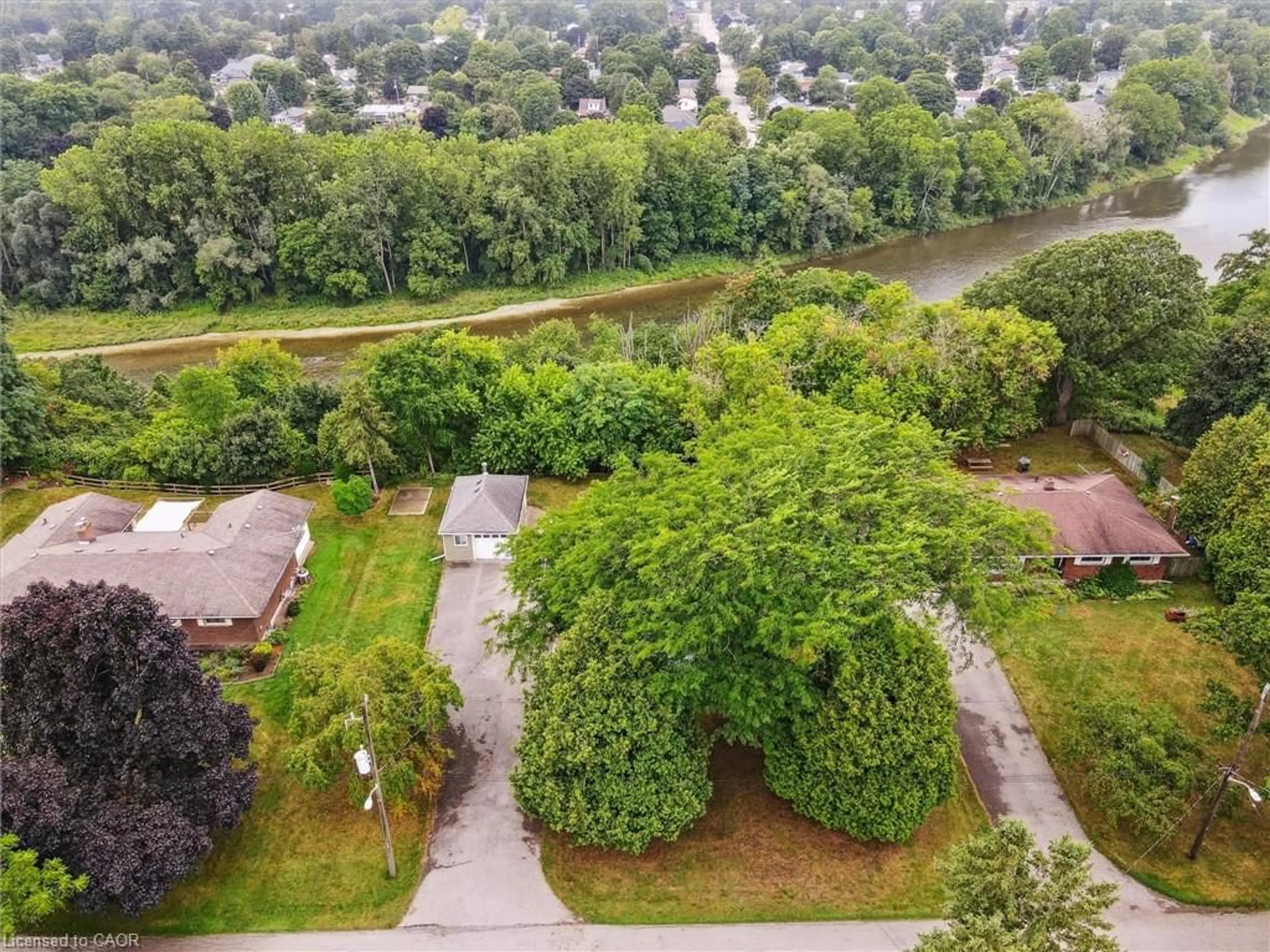 A pic from outside/outdoor area/front of a property/back of a property/a pic from drone, forest/trees view for 48 Curtis Ave, Paris Ontario N3L 3J7