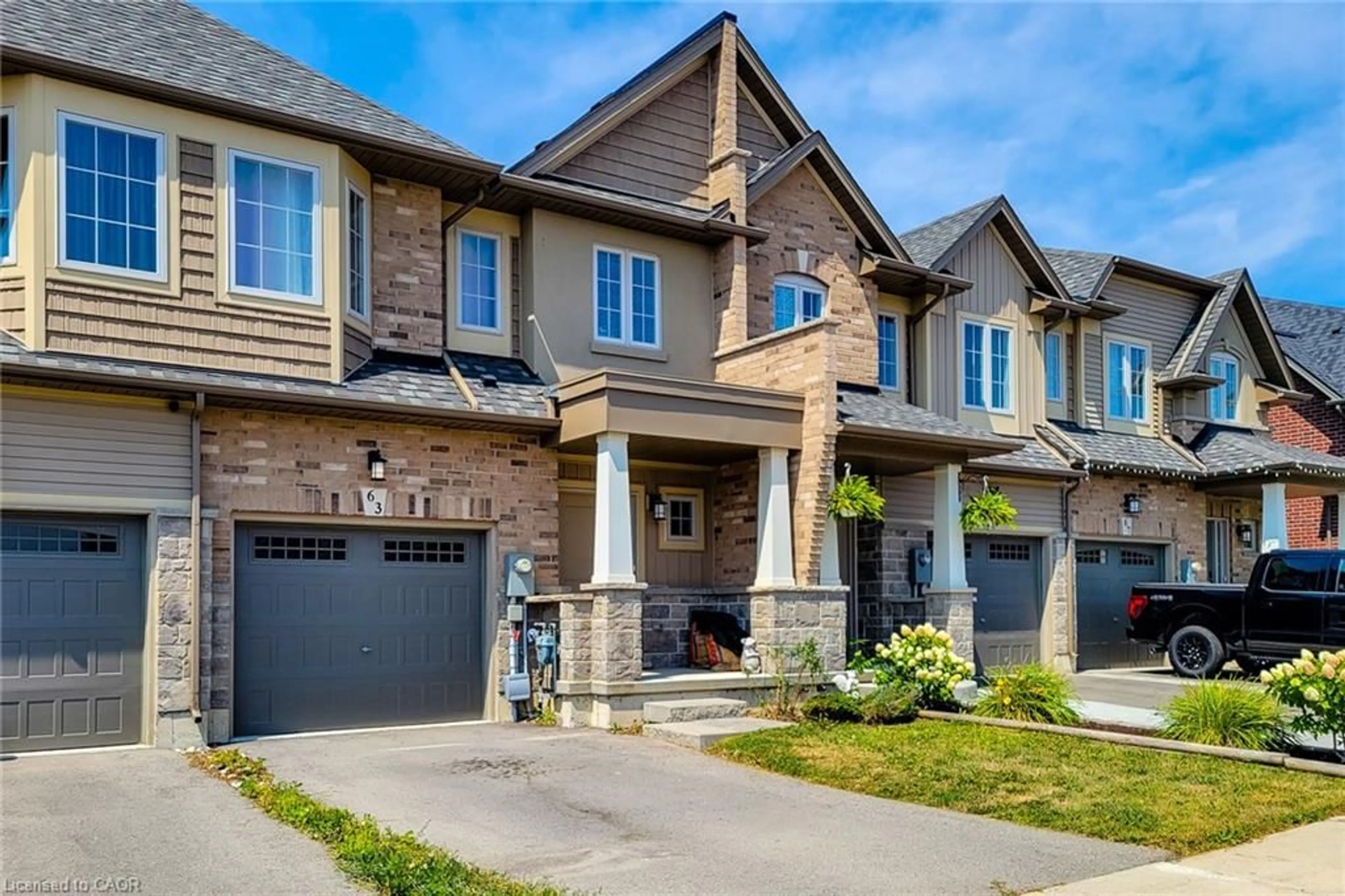 Home with brick exterior material, street for 63 Dennis Dr, Smithville Ontario L0R 2A0