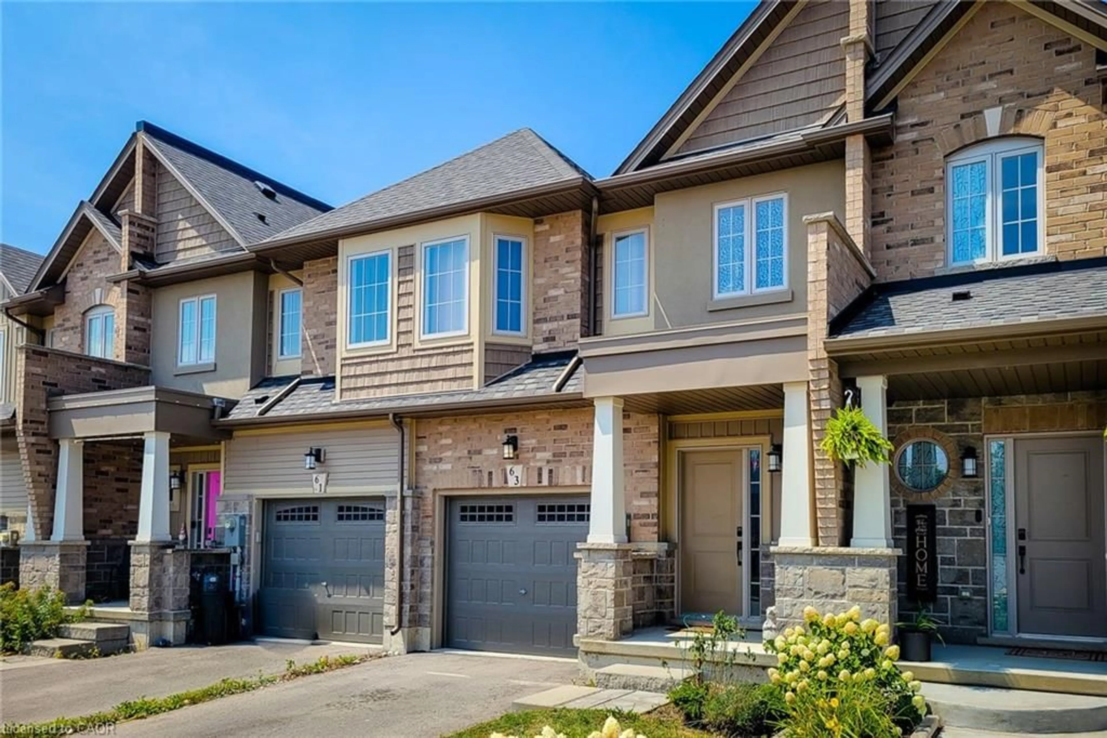 Home with brick exterior material, street for 63 Dennis Dr, Smithville Ontario L0R 2A0