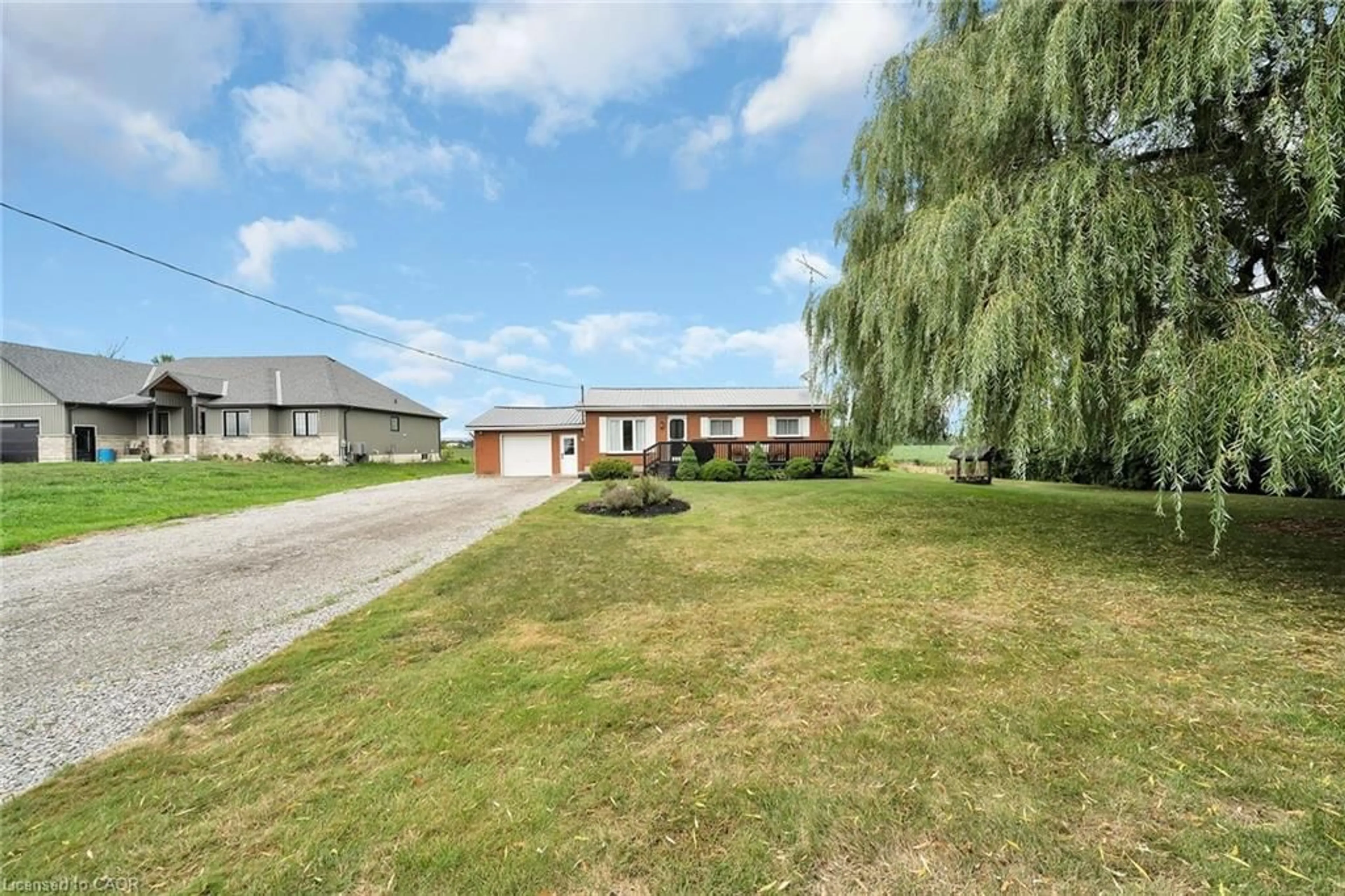 A pic from outside/outdoor area/front of a property/back of a property/a pic from drone, street for 1073 Concession 6 Woodhouse Rd, Simcoe Ontario N3Y 4K4