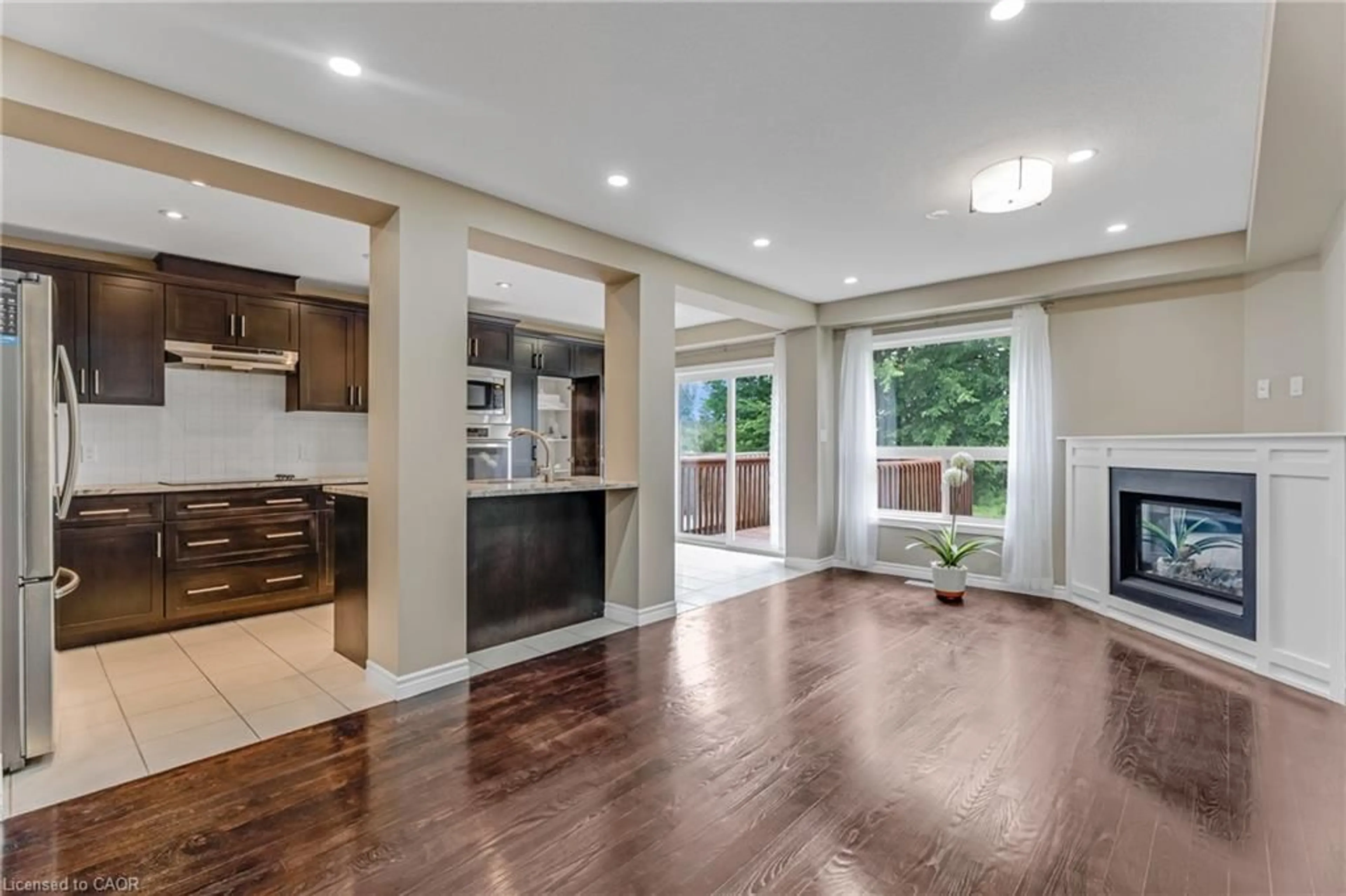 Open concept kitchen, wood/laminate floor for 448 Starwood Dr, Guelph Ontario N1E 0L6