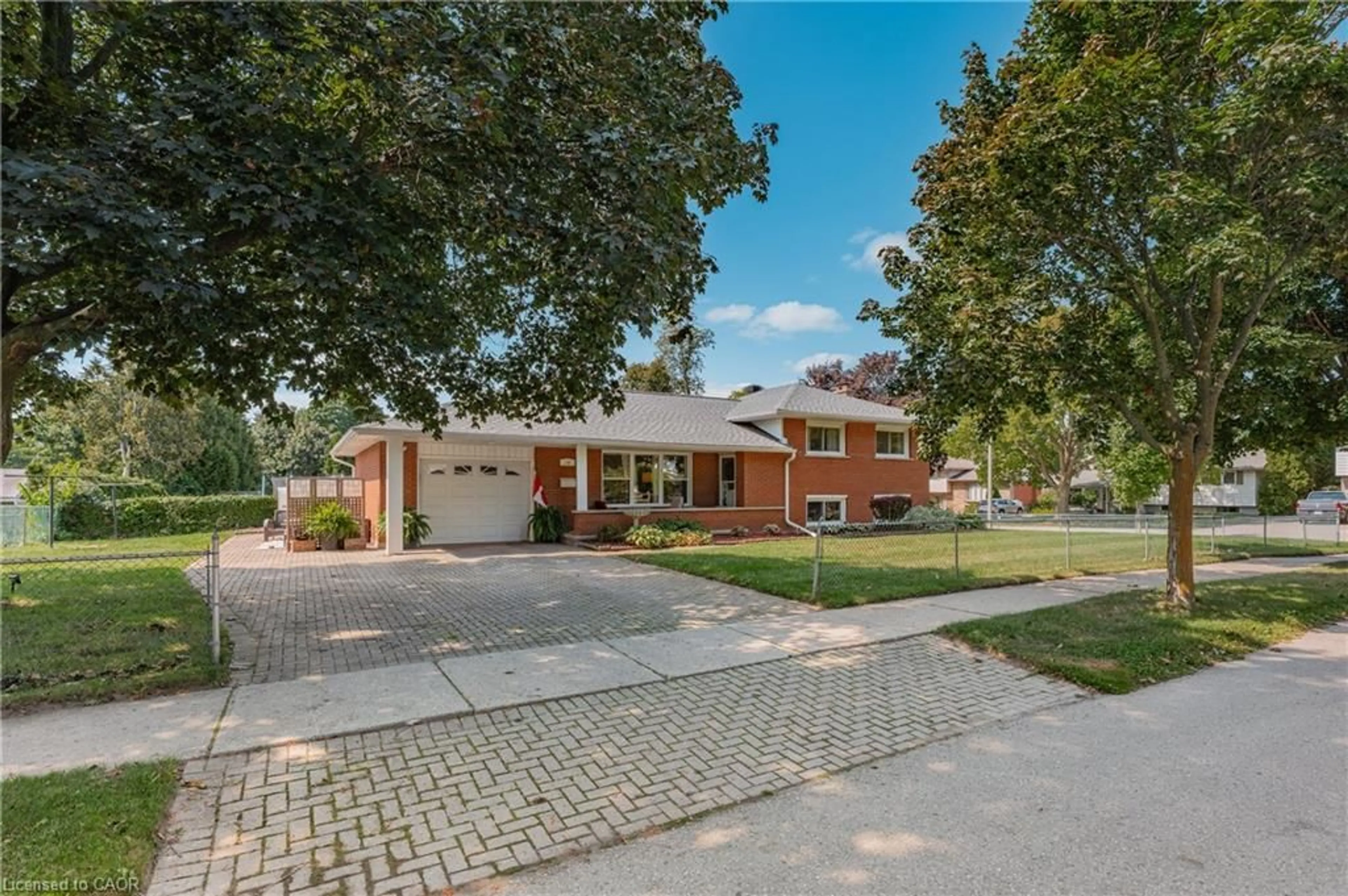Home with brick exterior material, street for 10 Inlet Ave, Kitchener Ontario N2B 2L8