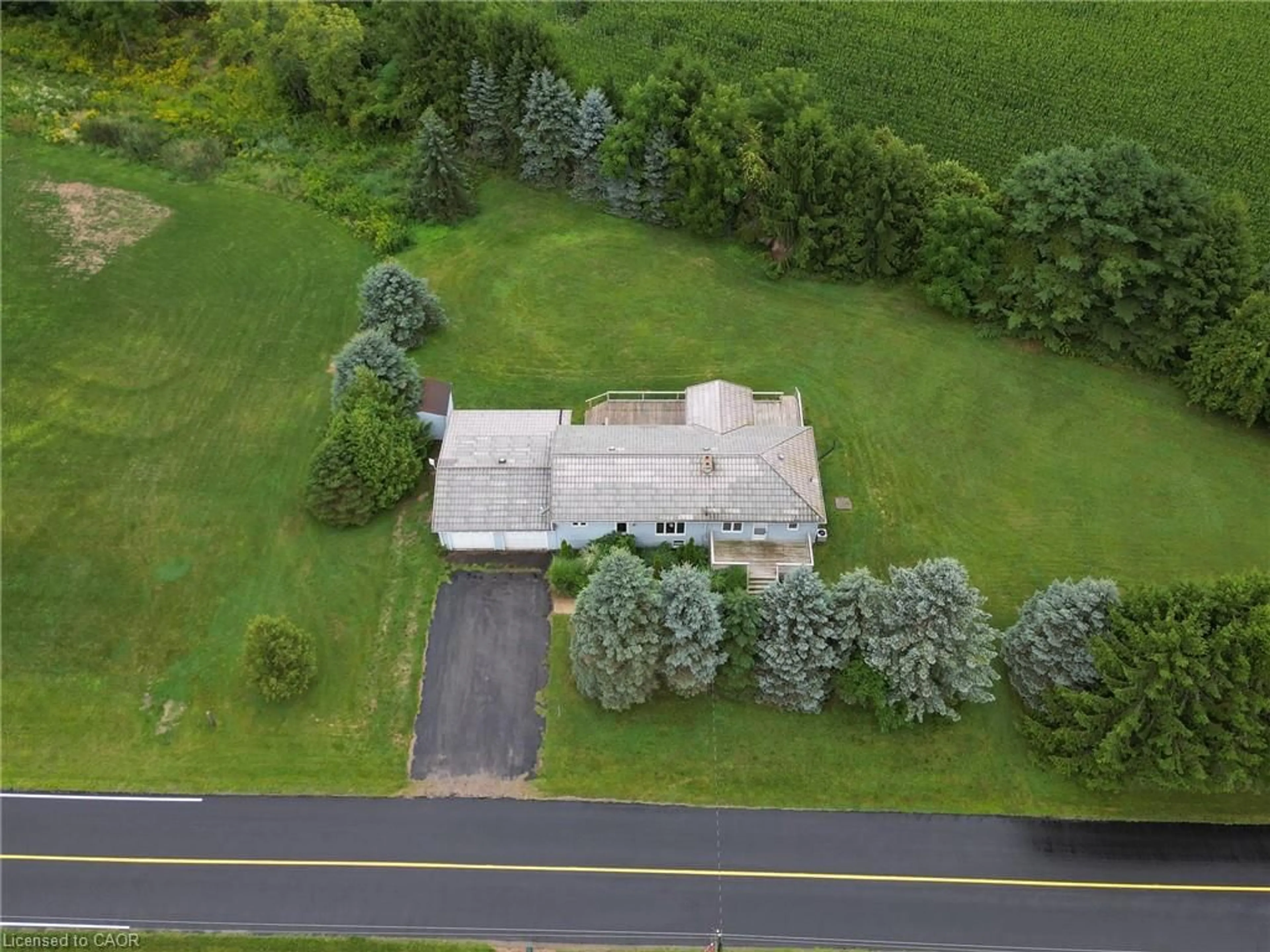 A pic from outside/outdoor area/front of a property/back of a property/a pic from drone, unknown for 35383 Lake Line, Southwold Ontario N5L 1J1