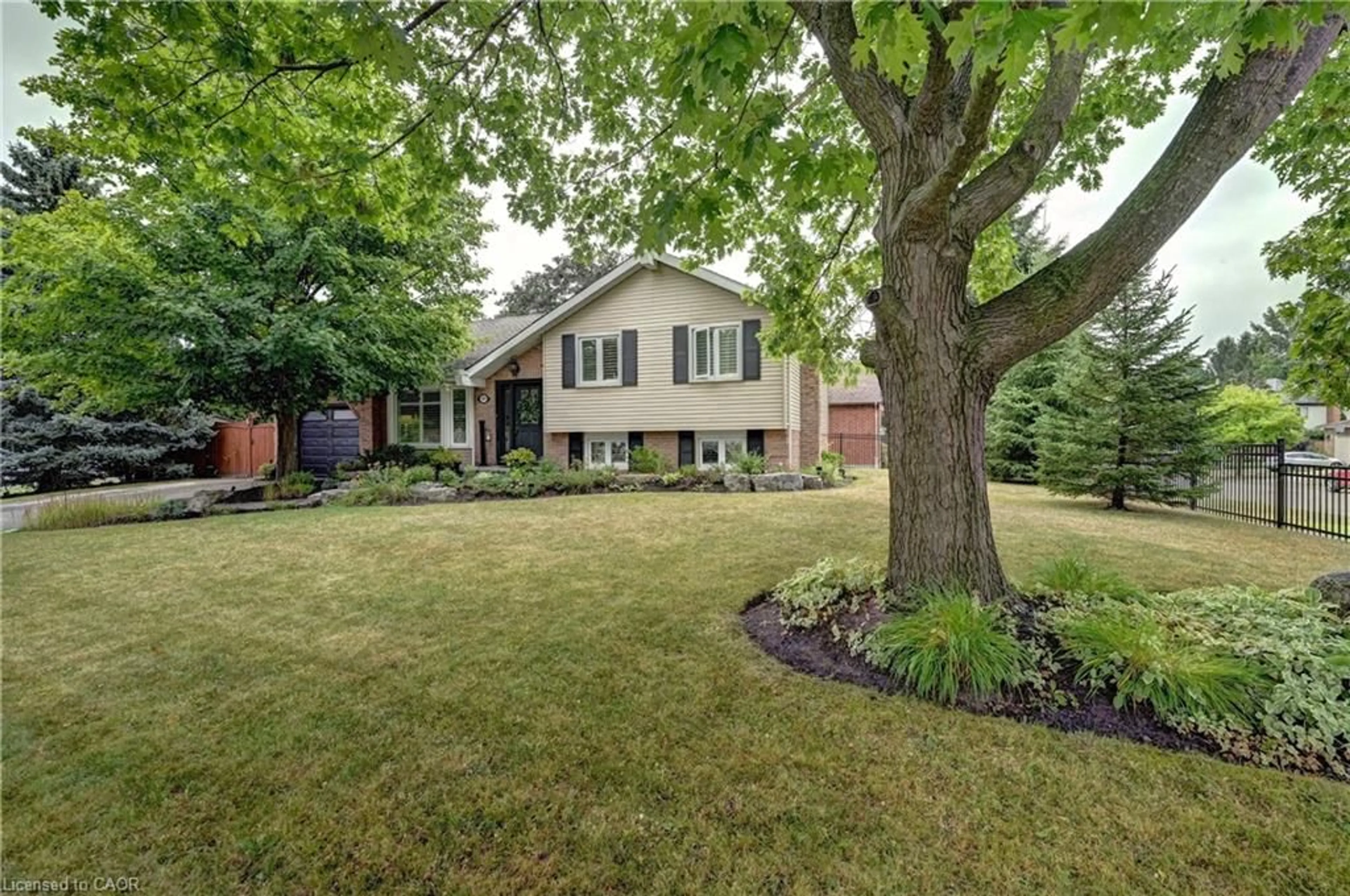 Home with brick exterior material, street for 159 Grand River Blvd, Kitchener Ontario N2A 3G5