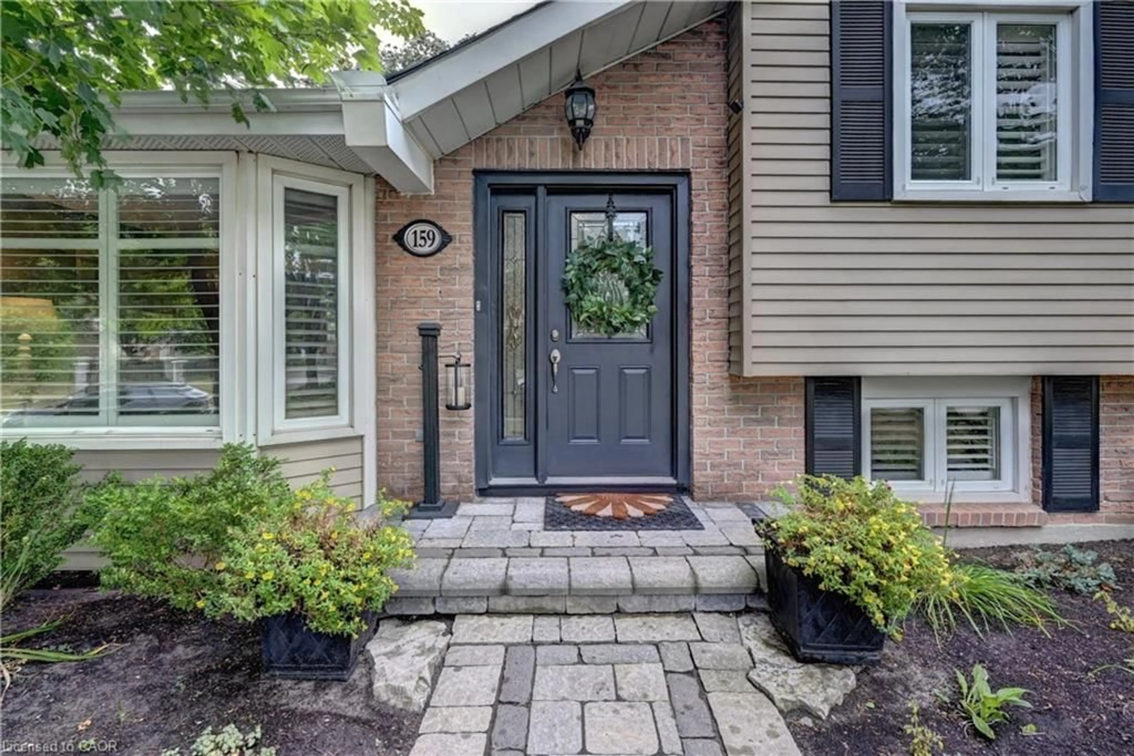 Home with brick exterior material, street for 159 Grand River Blvd, Kitchener Ontario N2A 3G5