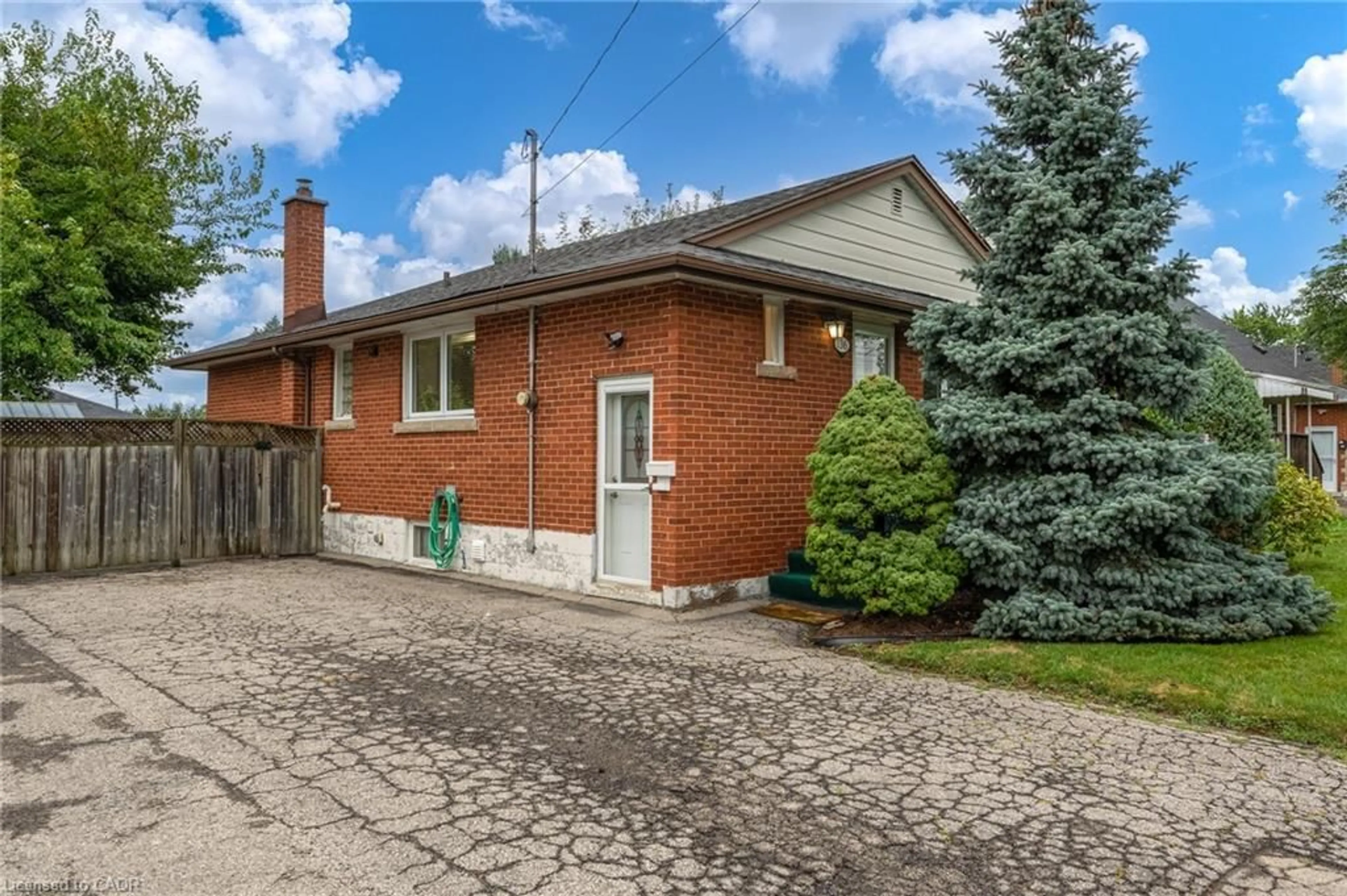 Home with brick exterior material, street for 136 Howard Ave, Hamilton Ontario L9A 2W7