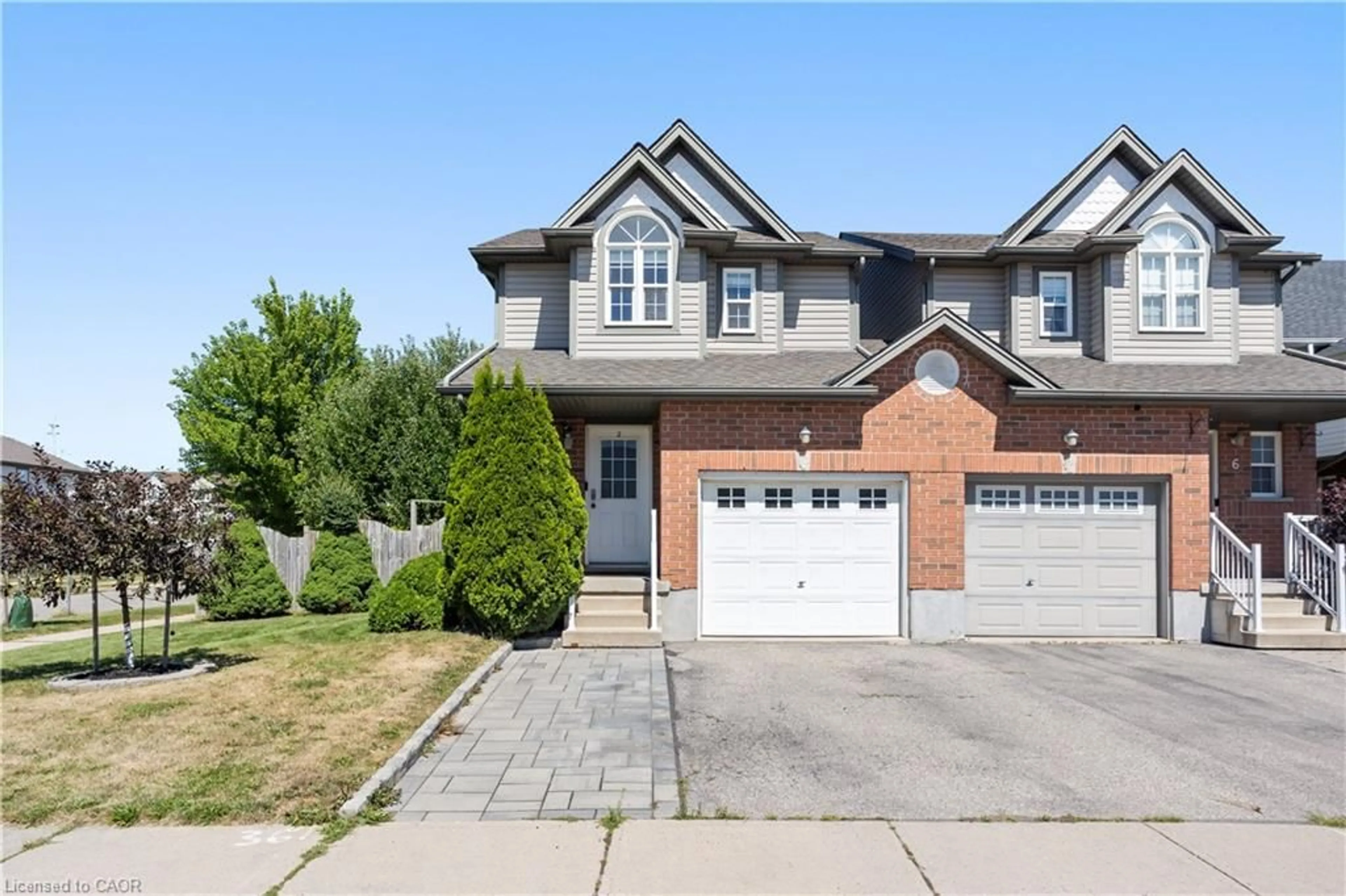 Home with brick exterior material, street for 2 Donnenwerth Dr, Kitchener Ontario N2E 3X2