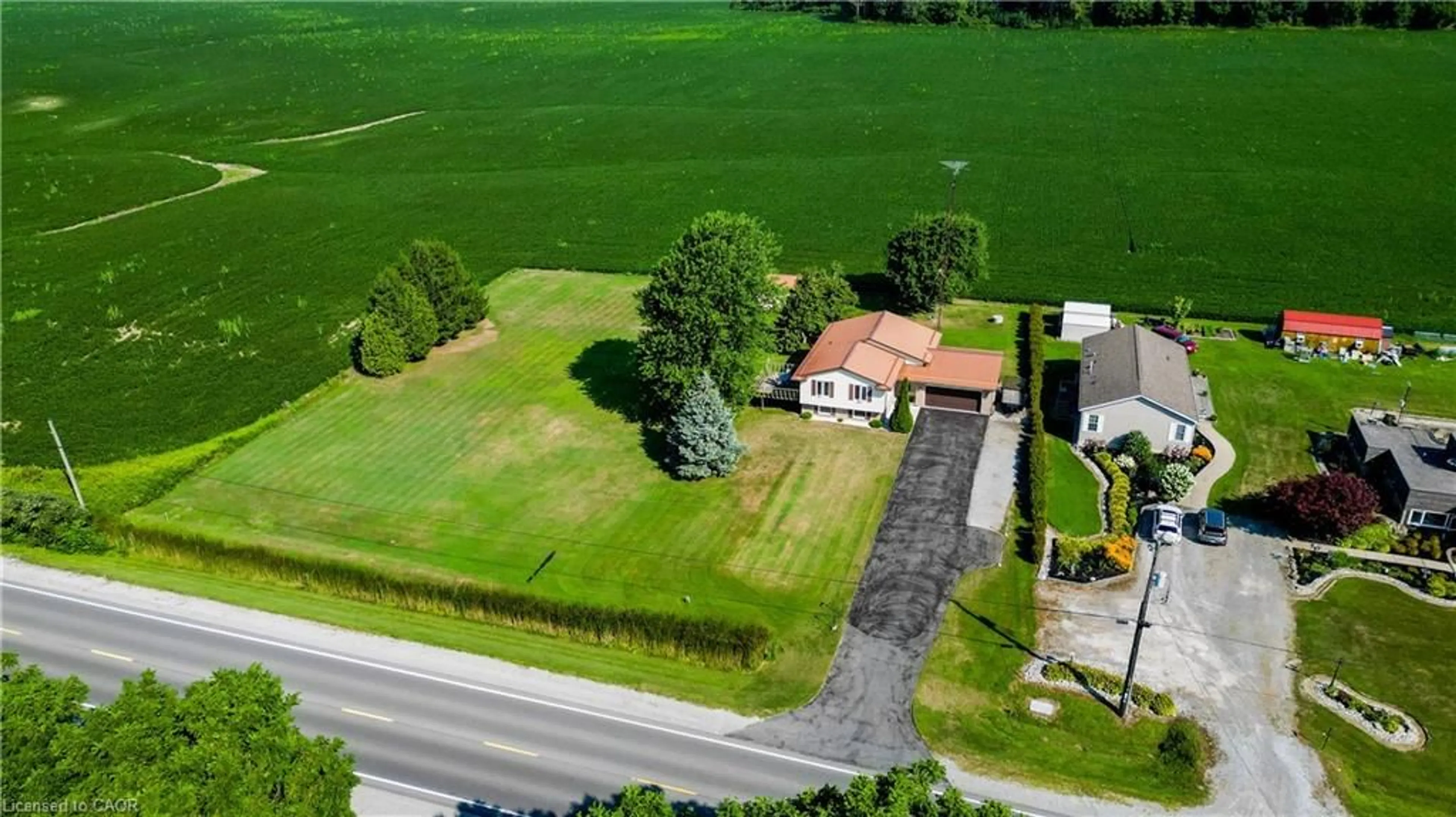 A pic from outside/outdoor area/front of a property/back of a property/a pic from drone, street for 4617 Highway 3, Simcoe Ontario N3Y 4K4
