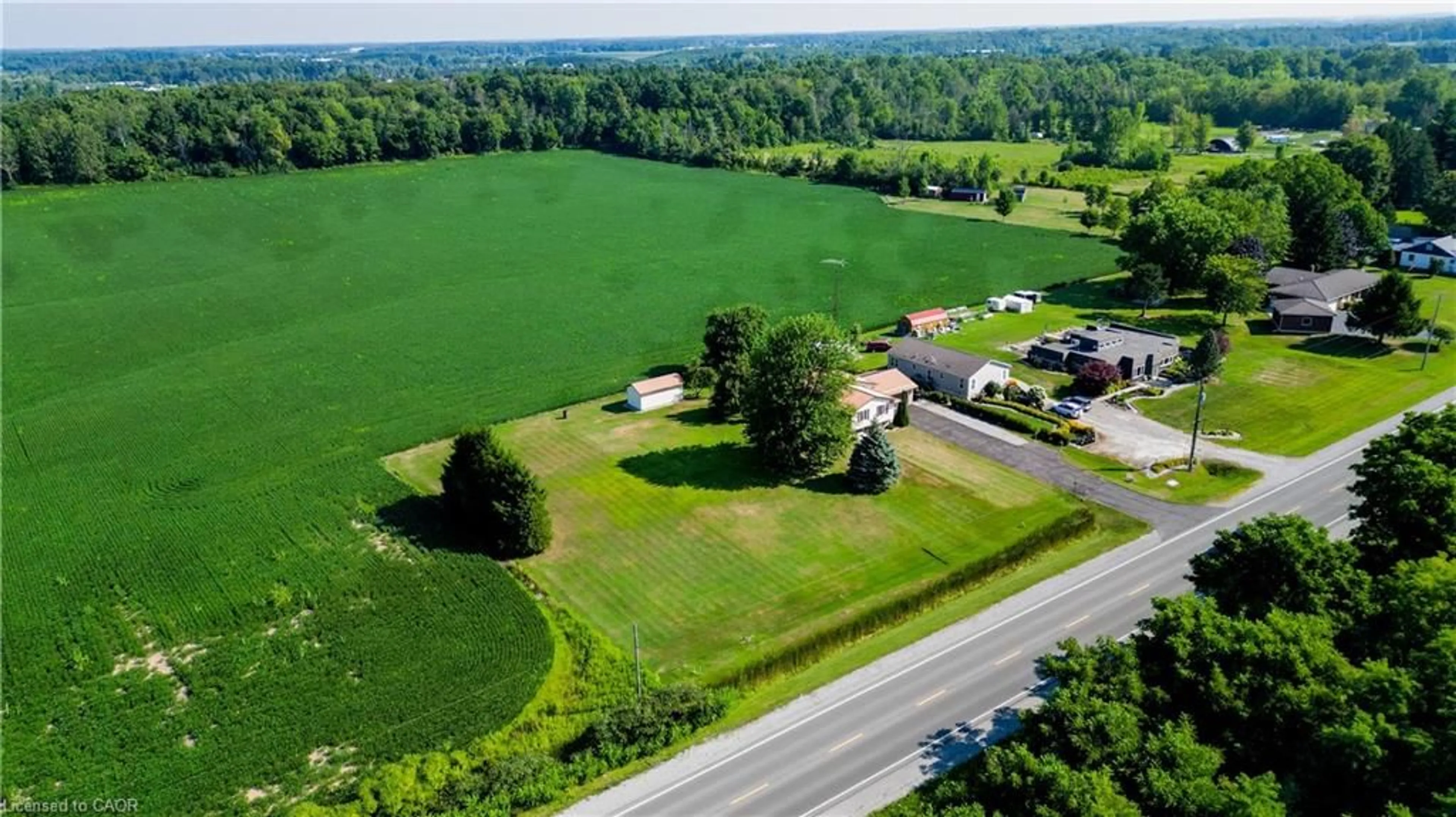 A pic from outside/outdoor area/front of a property/back of a property/a pic from drone, water/lake/river/ocean view for 4617 Highway 3, Simcoe Ontario N3Y 4K4