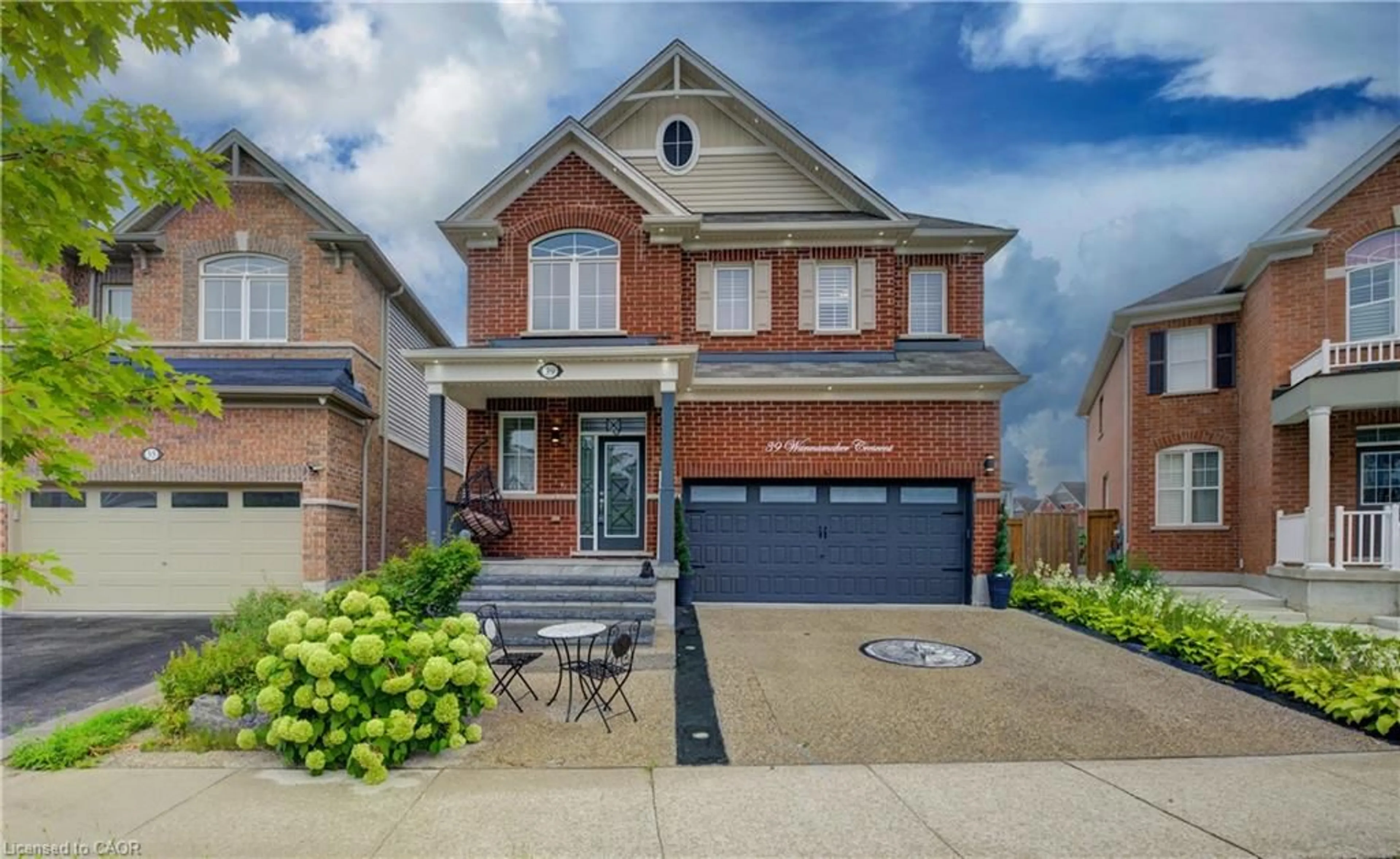 Home with brick exterior material, street for 39 Wannamaker Crescent, Cambridge Ontario N3E 0C5