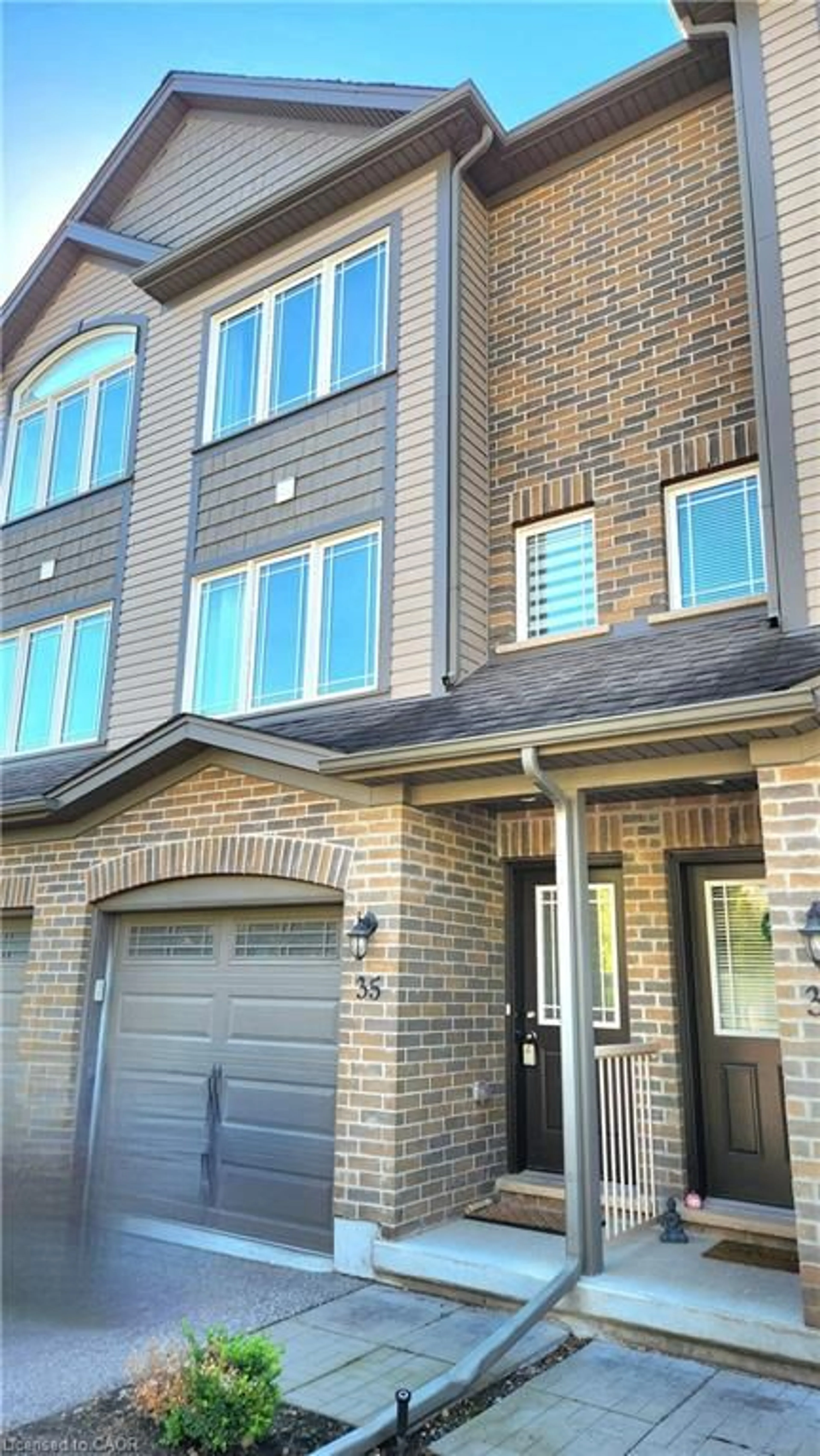 Home with brick exterior material, street for 12 Poplar Dr #35, Cambridge Ontario N3C 0G4