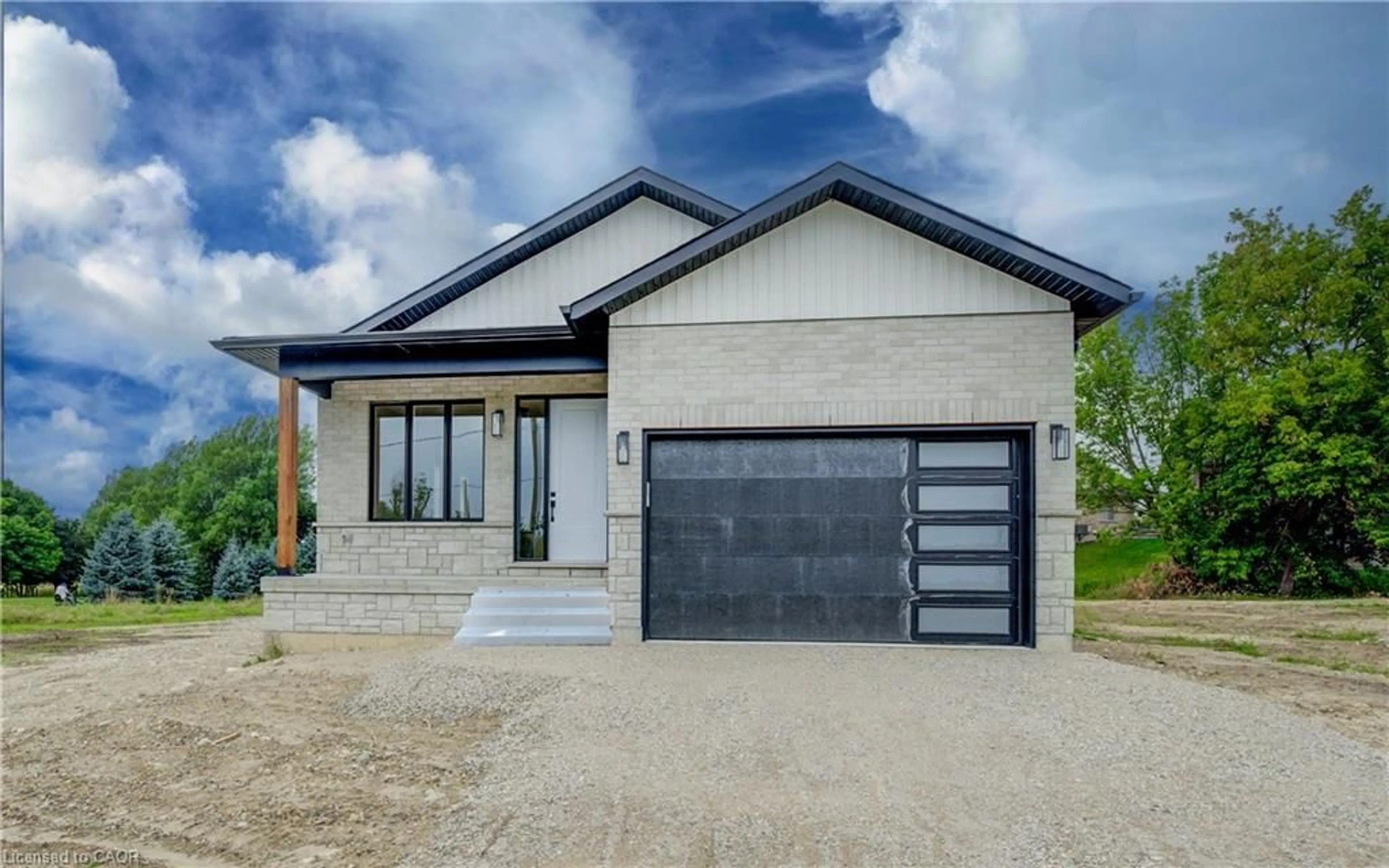 Home with brick exterior material, street for 647 Martin St, Mount Forest Ontario N0G 2L3