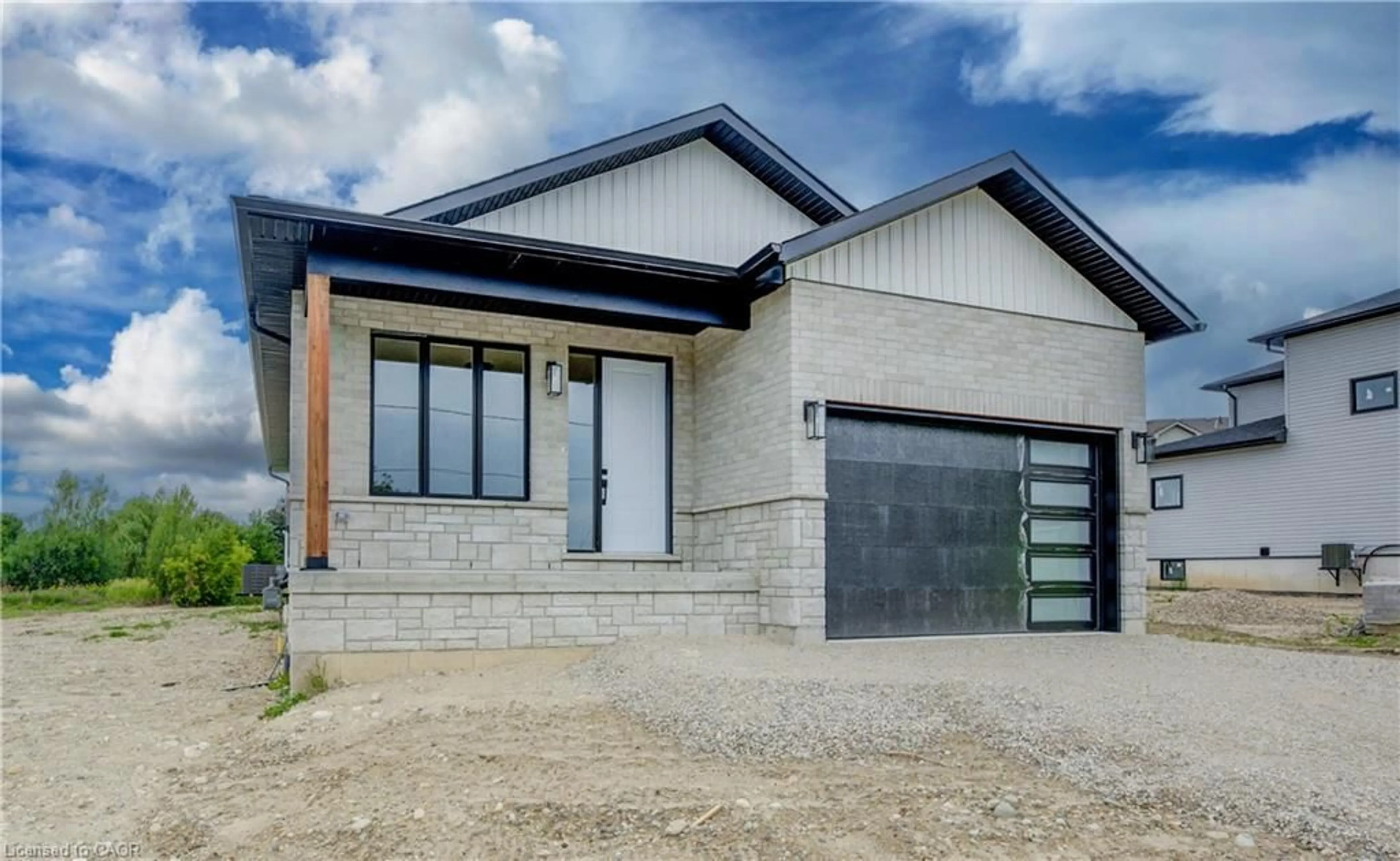 Home with brick exterior material, street for 647 Martin St, Mount Forest Ontario N0G 2L3