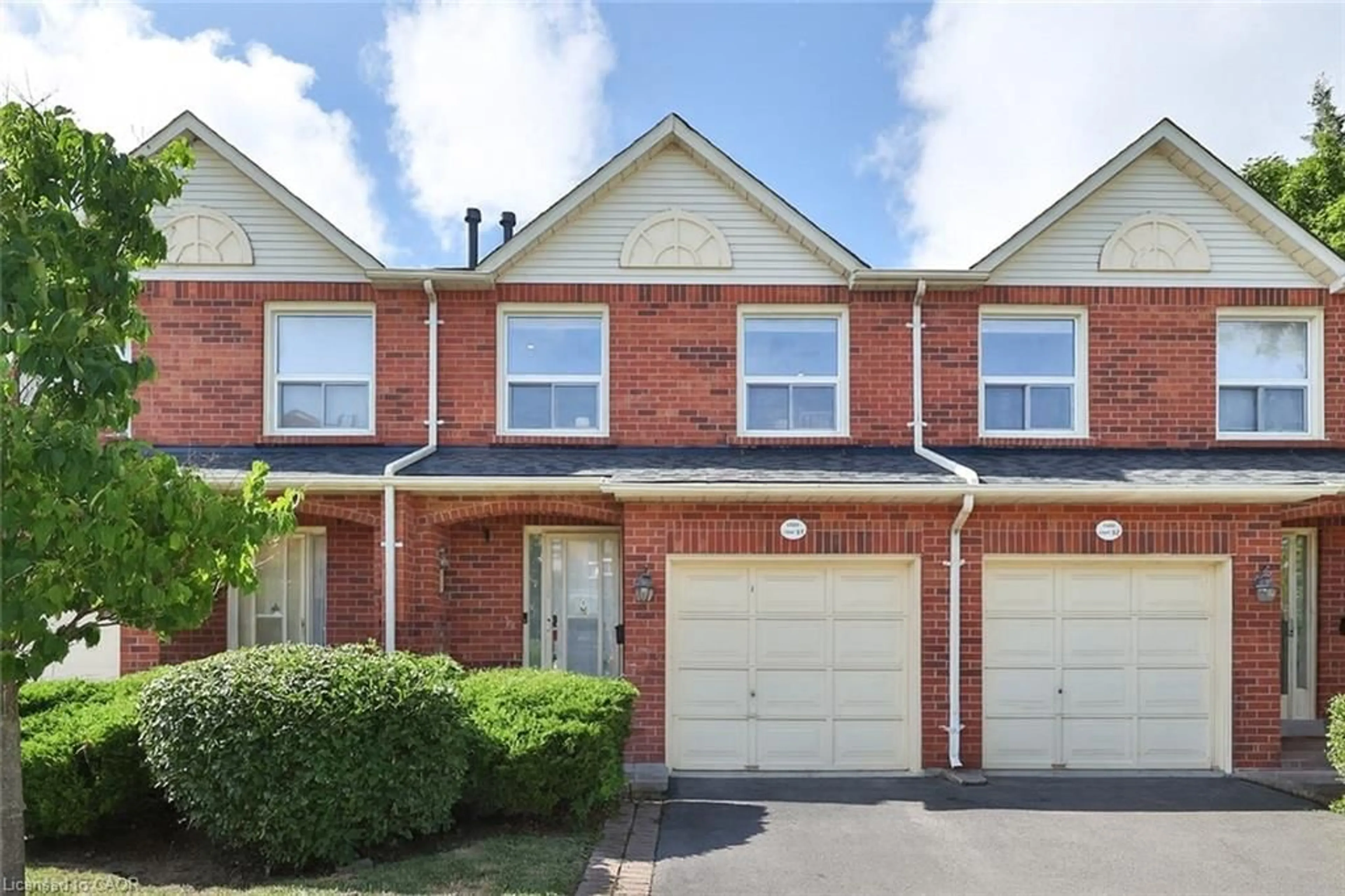 Home with brick exterior material, street for 1580 Reeves Gate #31, Oakville Ontario L6M 3J3