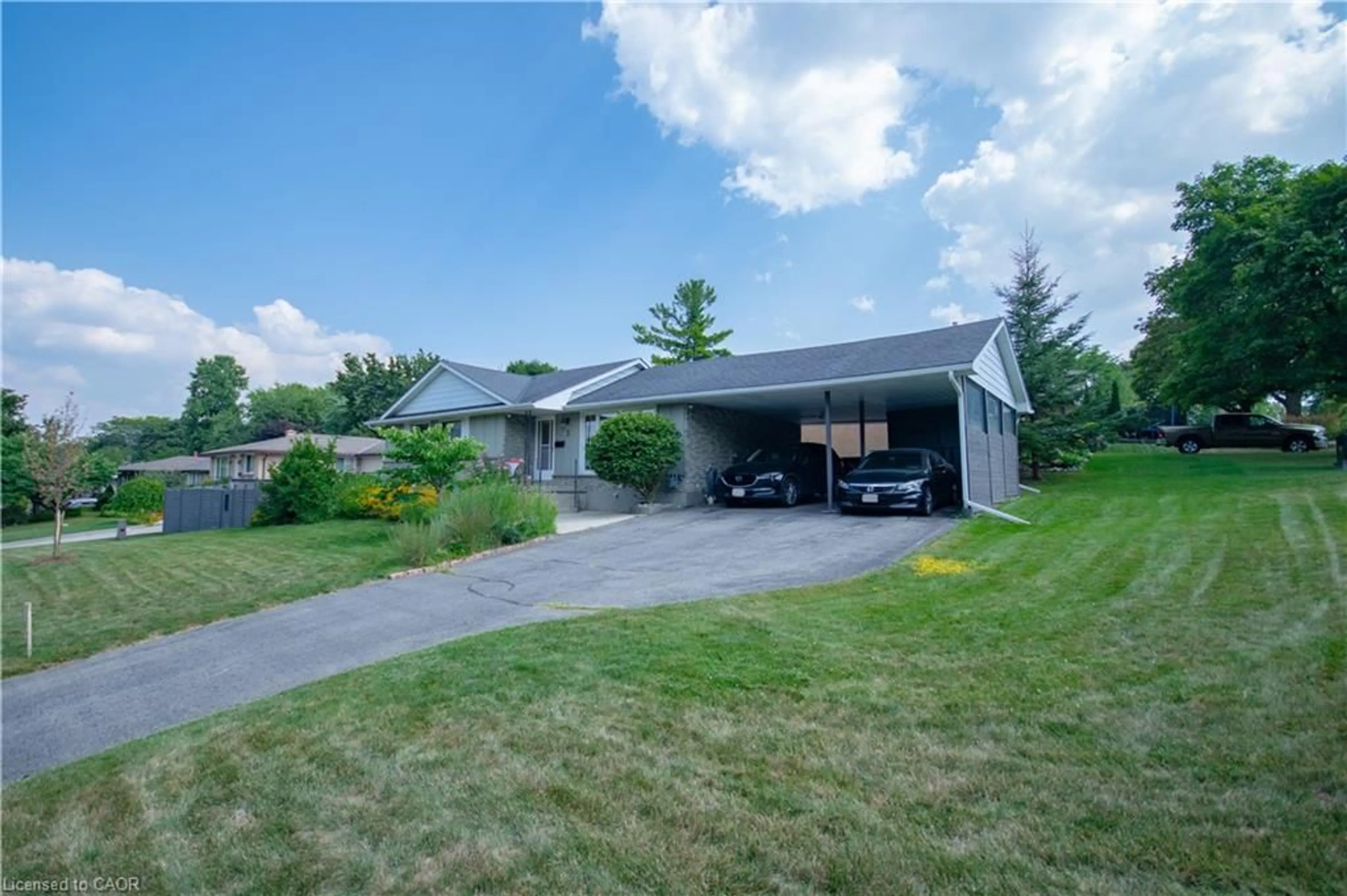 A pic from outside/outdoor area/front of a property/back of a property/a pic from drone, street for 2 Grenada Dr, Simcoe Ontario N3Y 3E7