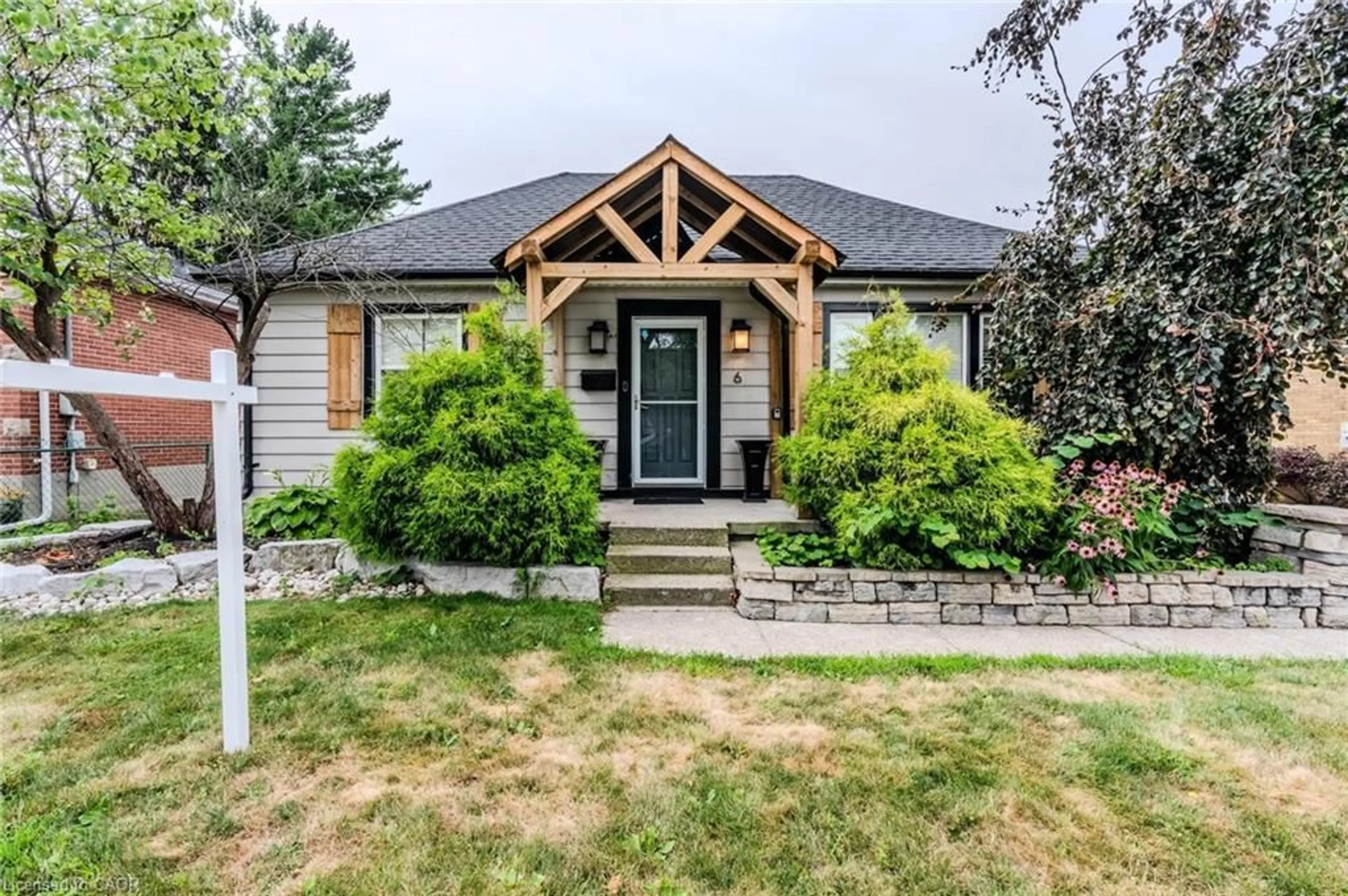 Home with vinyl exterior material, street for 6 Sussex Ave, Brantford Ontario N3R 2G6