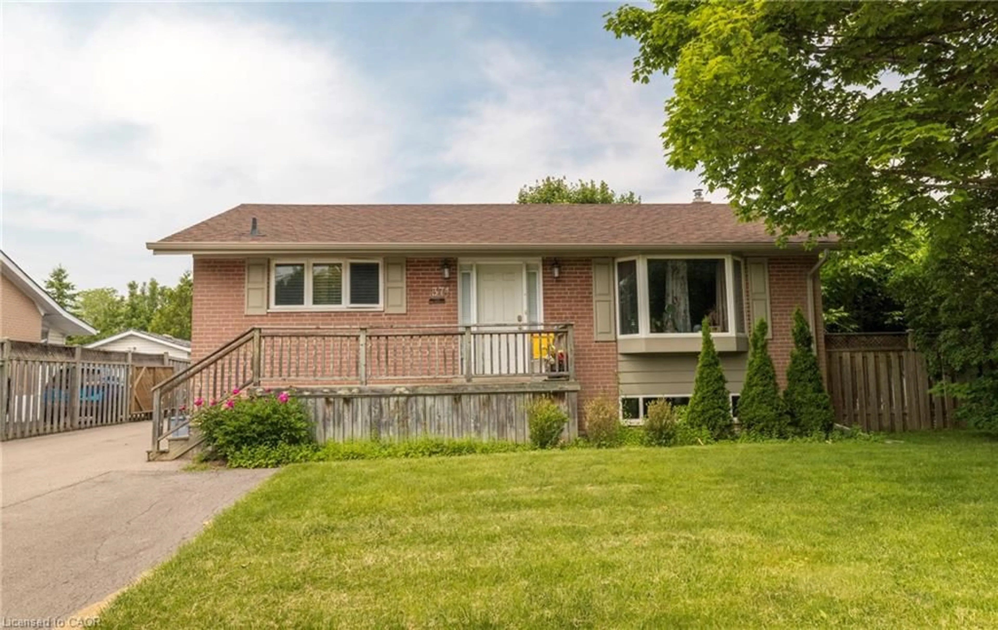 Home with brick exterior material, street for 371 Meadowbrook Dr, Milton Ontario L9T 2C1