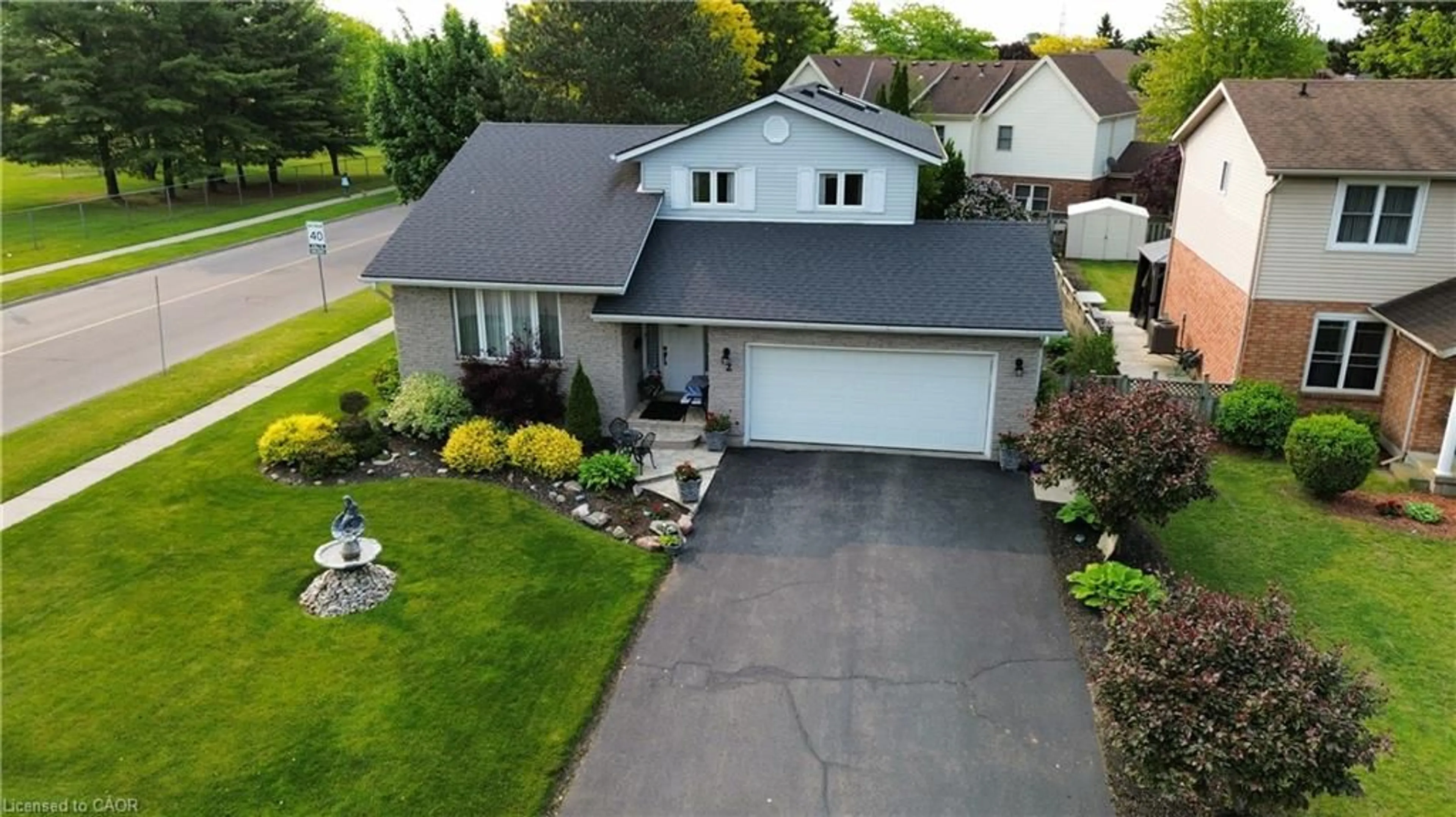 A pic from outside/outdoor area/front of a property/back of a property/a pic from drone, street for 2 Angle St, Simcoe Ontario N3Y 5G6