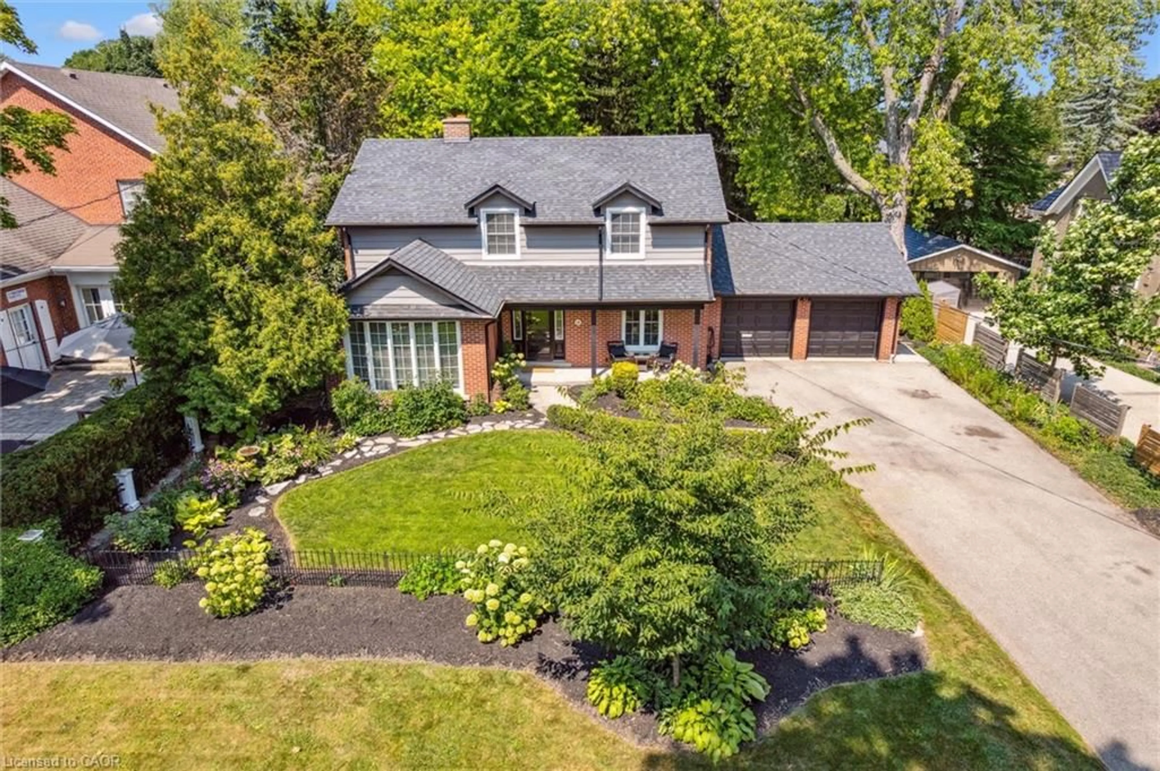 A pic from outside/outdoor area/front of a property/back of a property/a pic from drone, street for 136 Palmer St, Guelph Ontario N1E 2R4