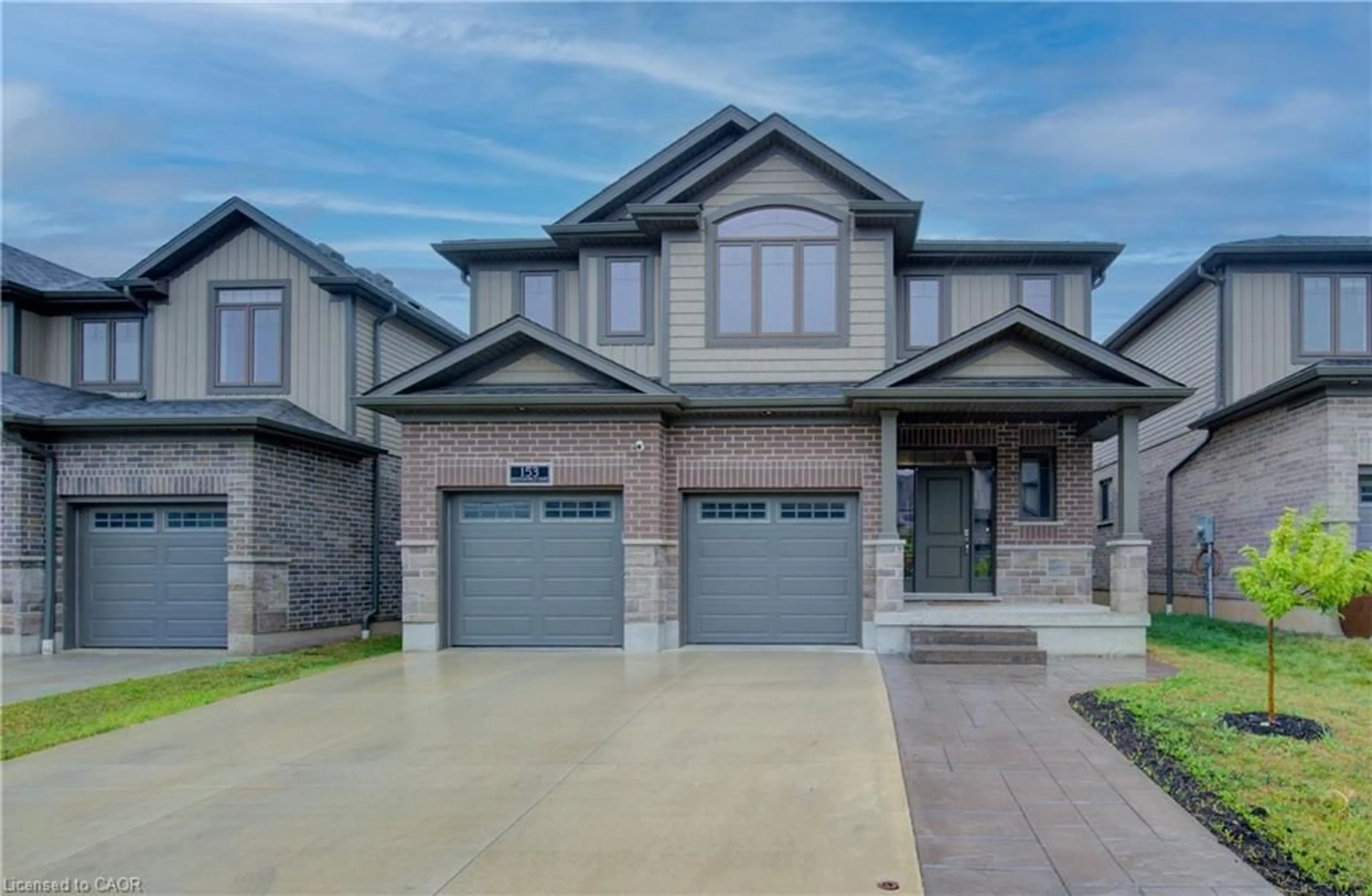 Home with brick exterior material, street for 153 Mountain Holly Ct, Waterloo Ontario N2V 0E1