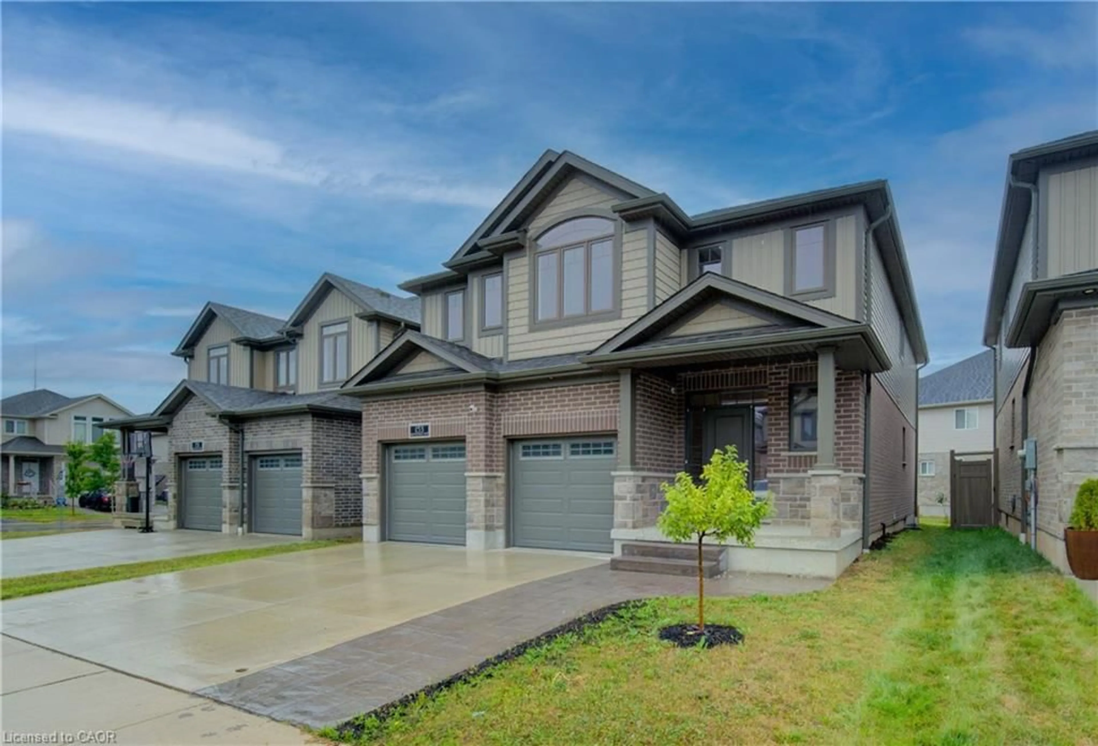 Home with brick exterior material, street for 153 Mountain Holly Ct, Waterloo Ontario N2V 0E1