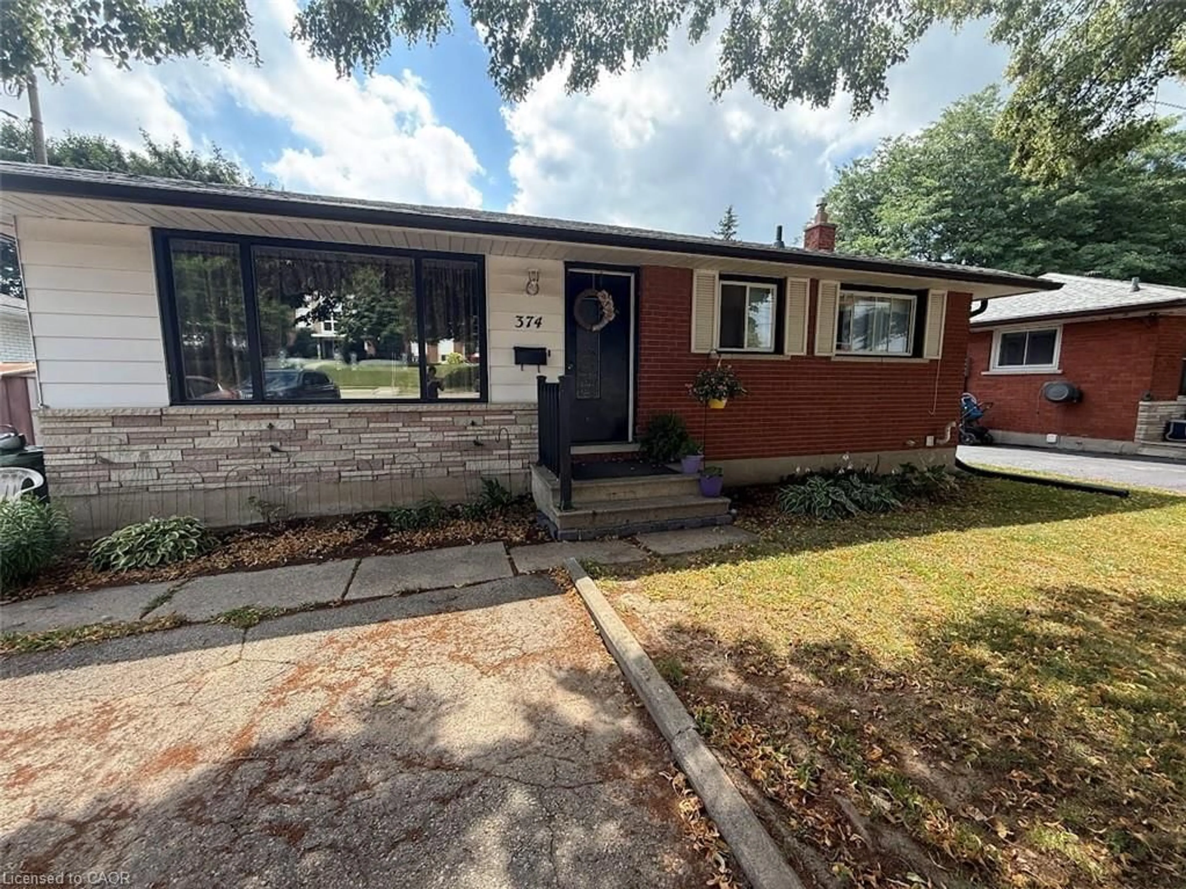Home with brick exterior material, street for 374 Victoria Rd, Guelph Ontario N1E 5J7