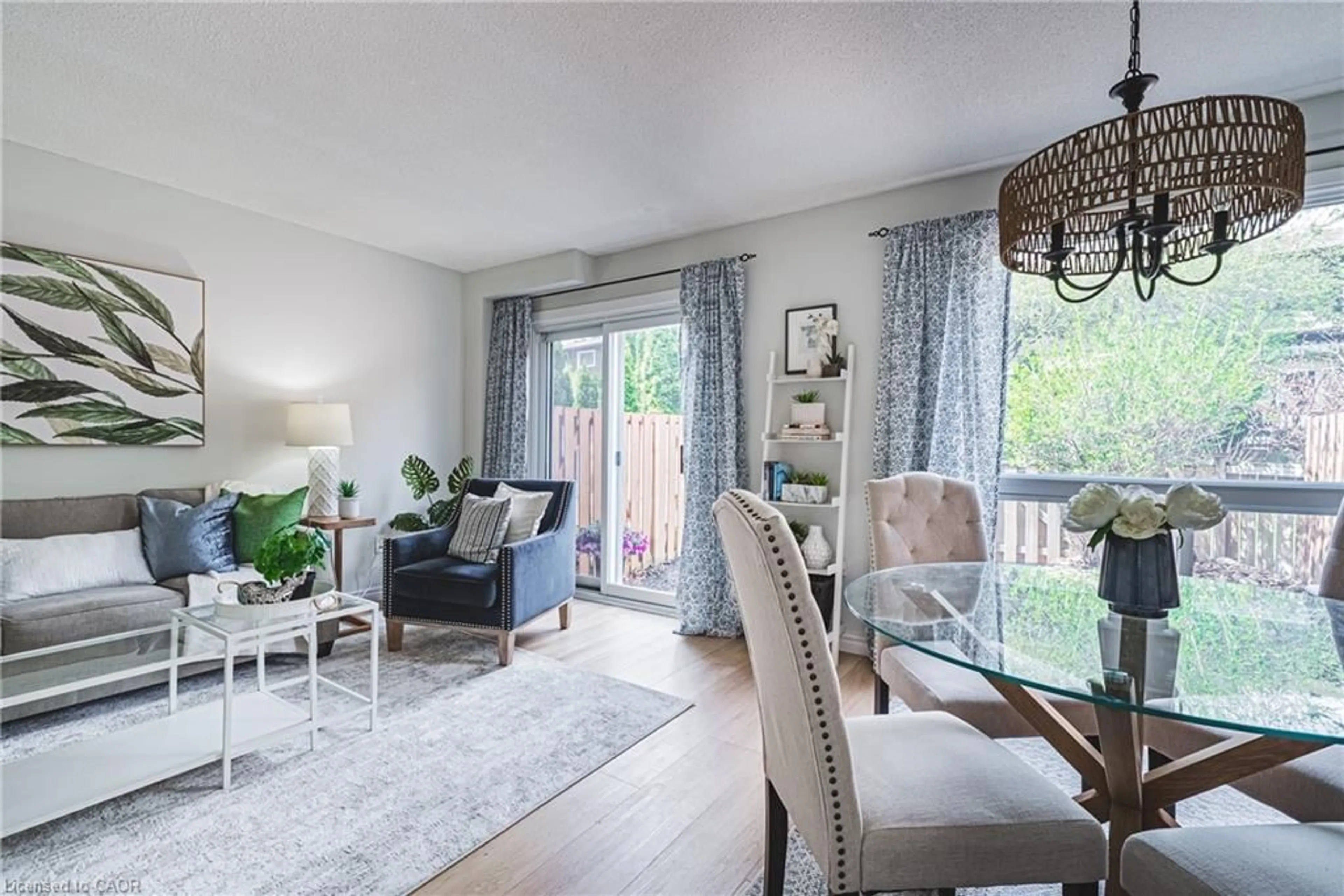 Living room with furniture, wood/laminate floor for 2301 Cavendish Dr #137, Burlington Ontario L7P 3M3