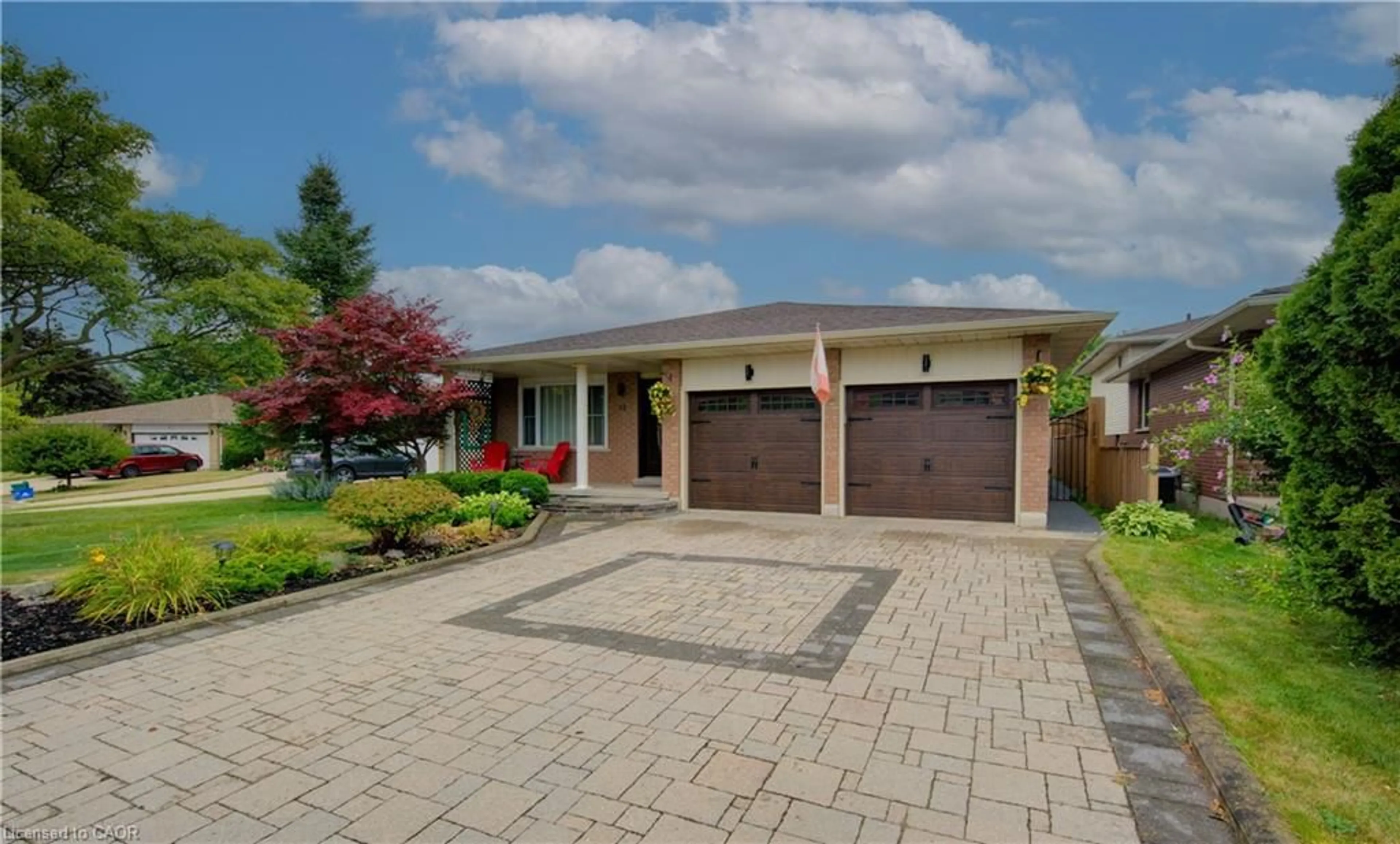 Home with brick exterior material, street for 12 Mccabe Crt, Kitchener Ontario N2E 2W9