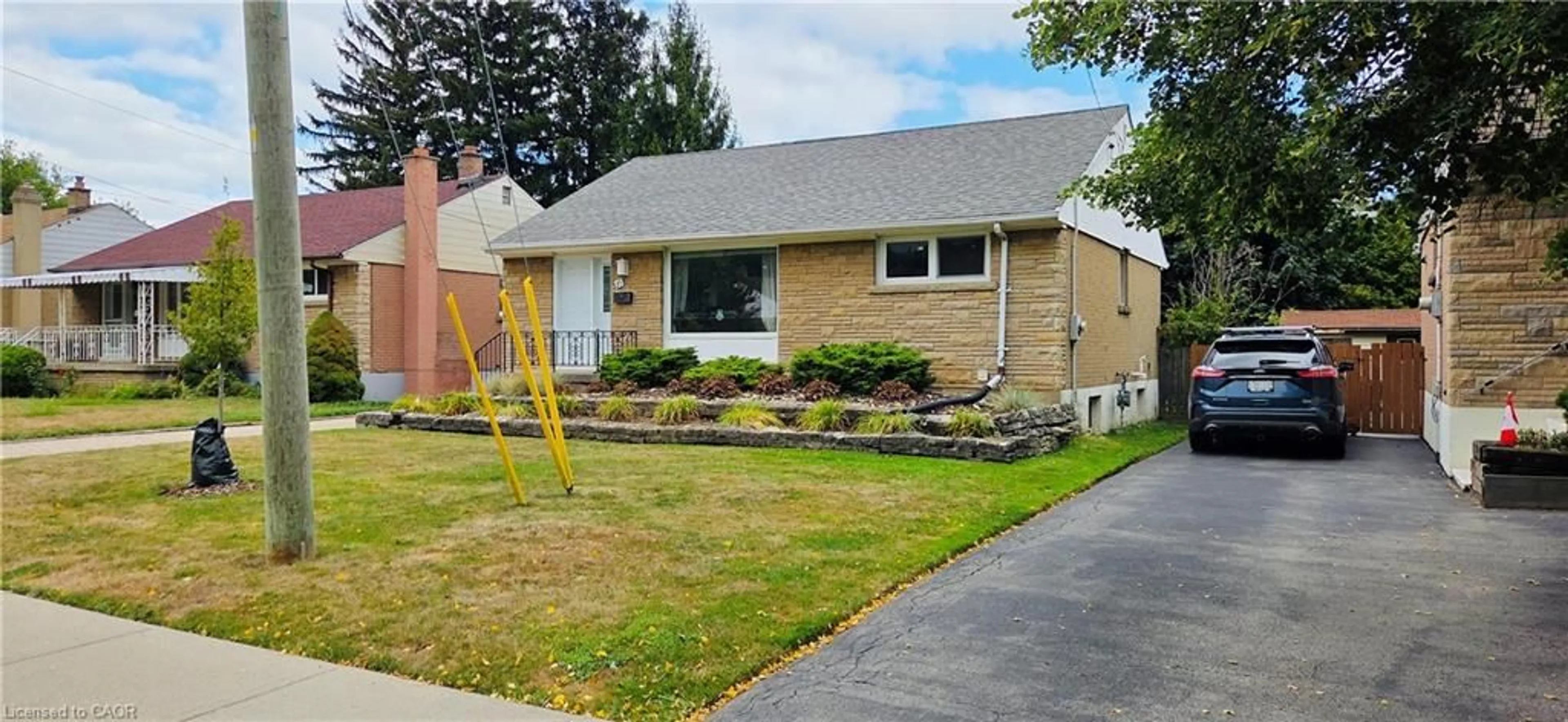 Home with vinyl exterior material, street for 15 Mericourt Rd, Hamilton Ontario L8S 2N5