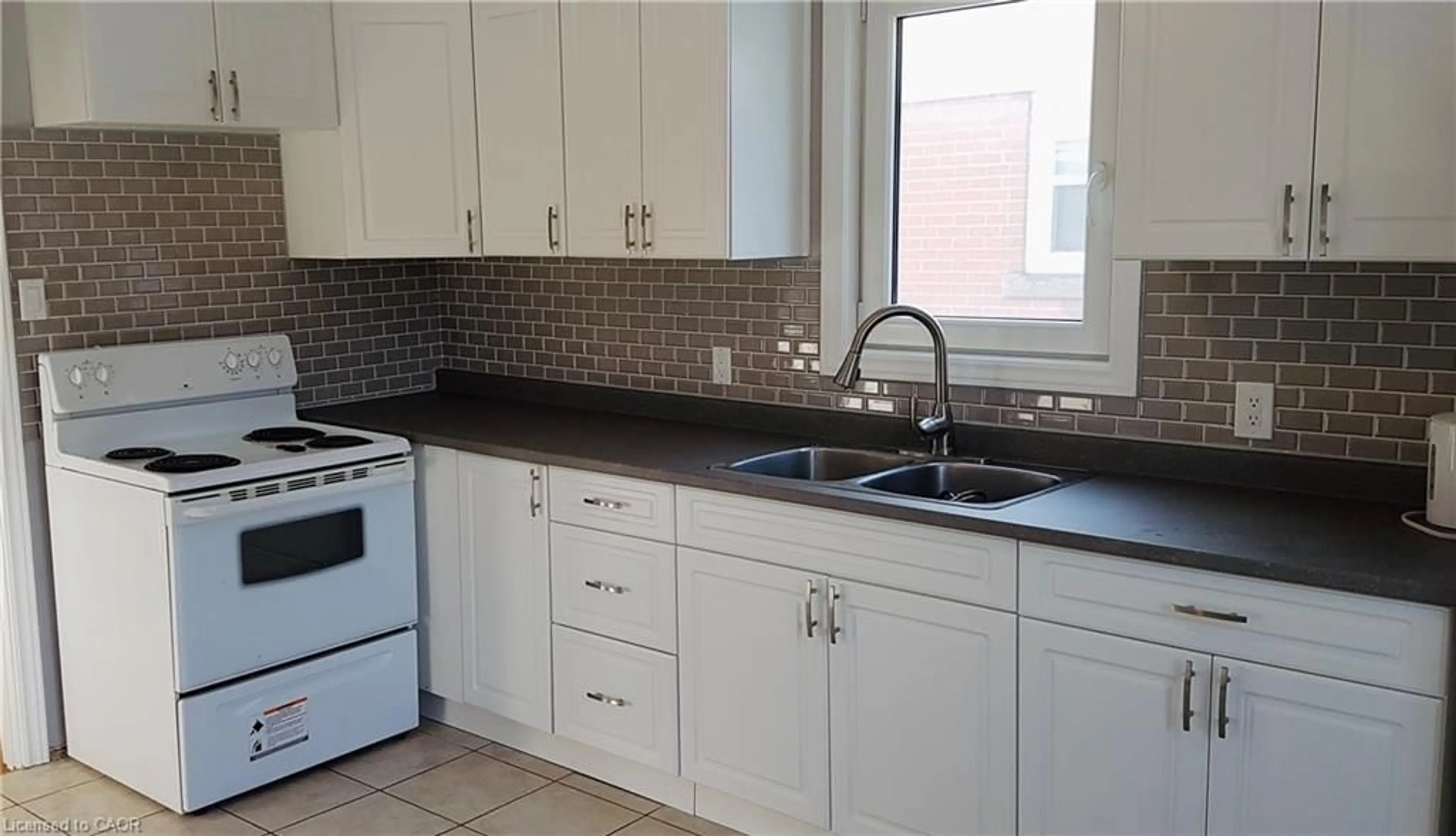 Standard kitchen, ceramic/tile floor for 15 Mericourt Rd, Hamilton Ontario L8S 2N5