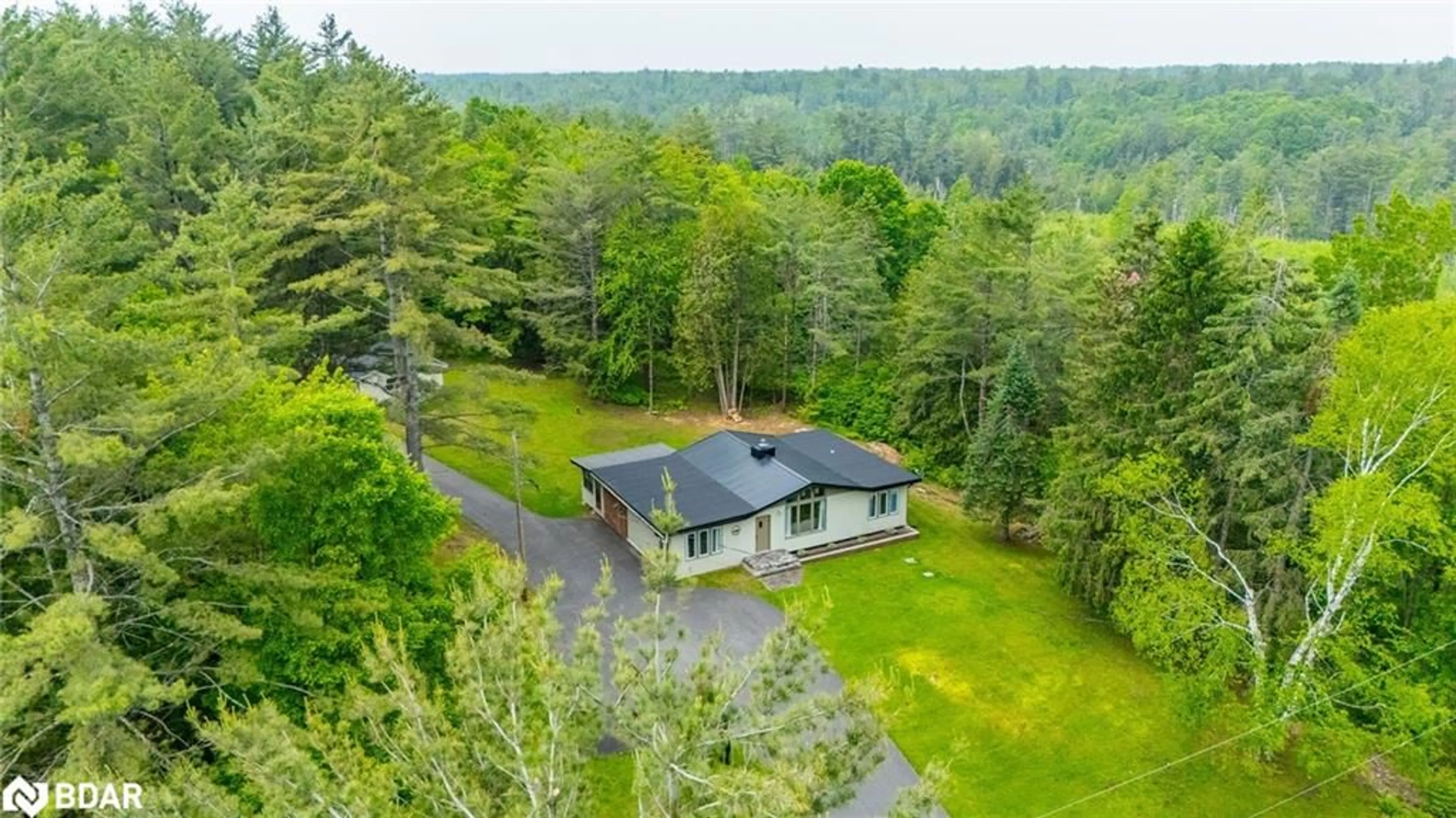 A pic from outside/outdoor area/front of a property/back of a property/a pic from drone, unknown for 4001 County Rd 121, Kawartha Lakes Ontario K0M 2A0