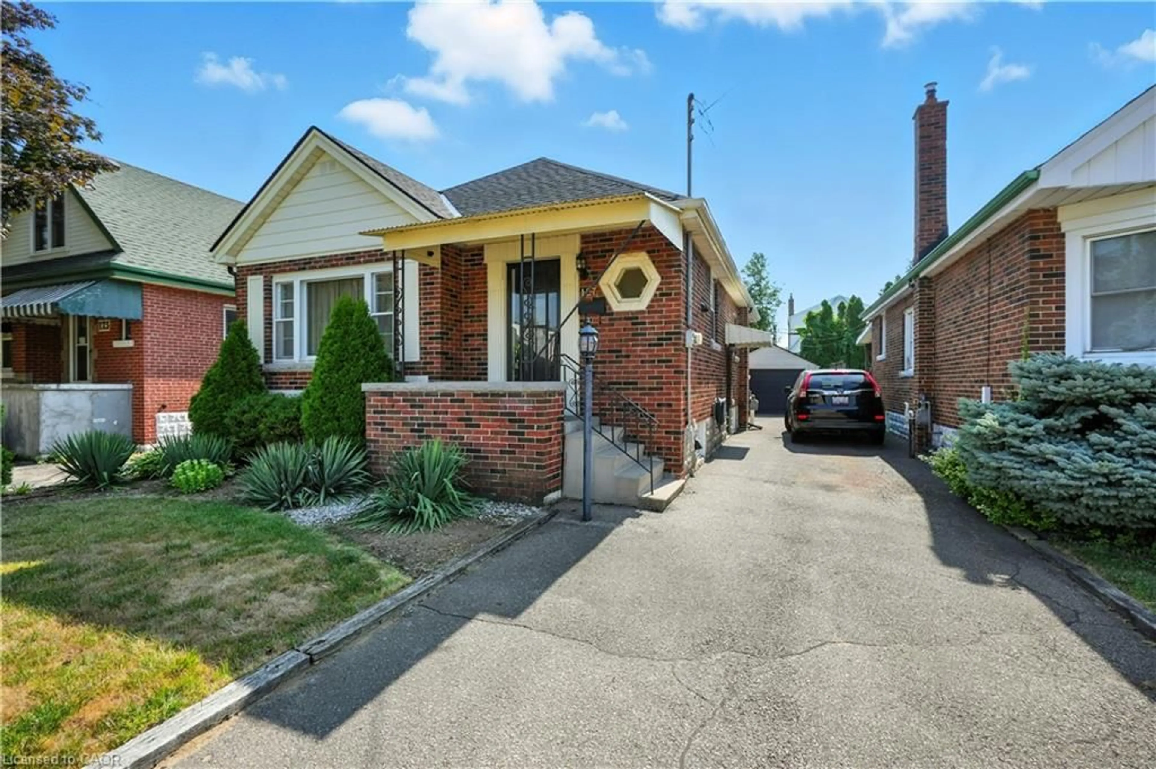 Home with brick exterior material, street for 127 Garside Ave, Hamilton Ontario L8K 2W1