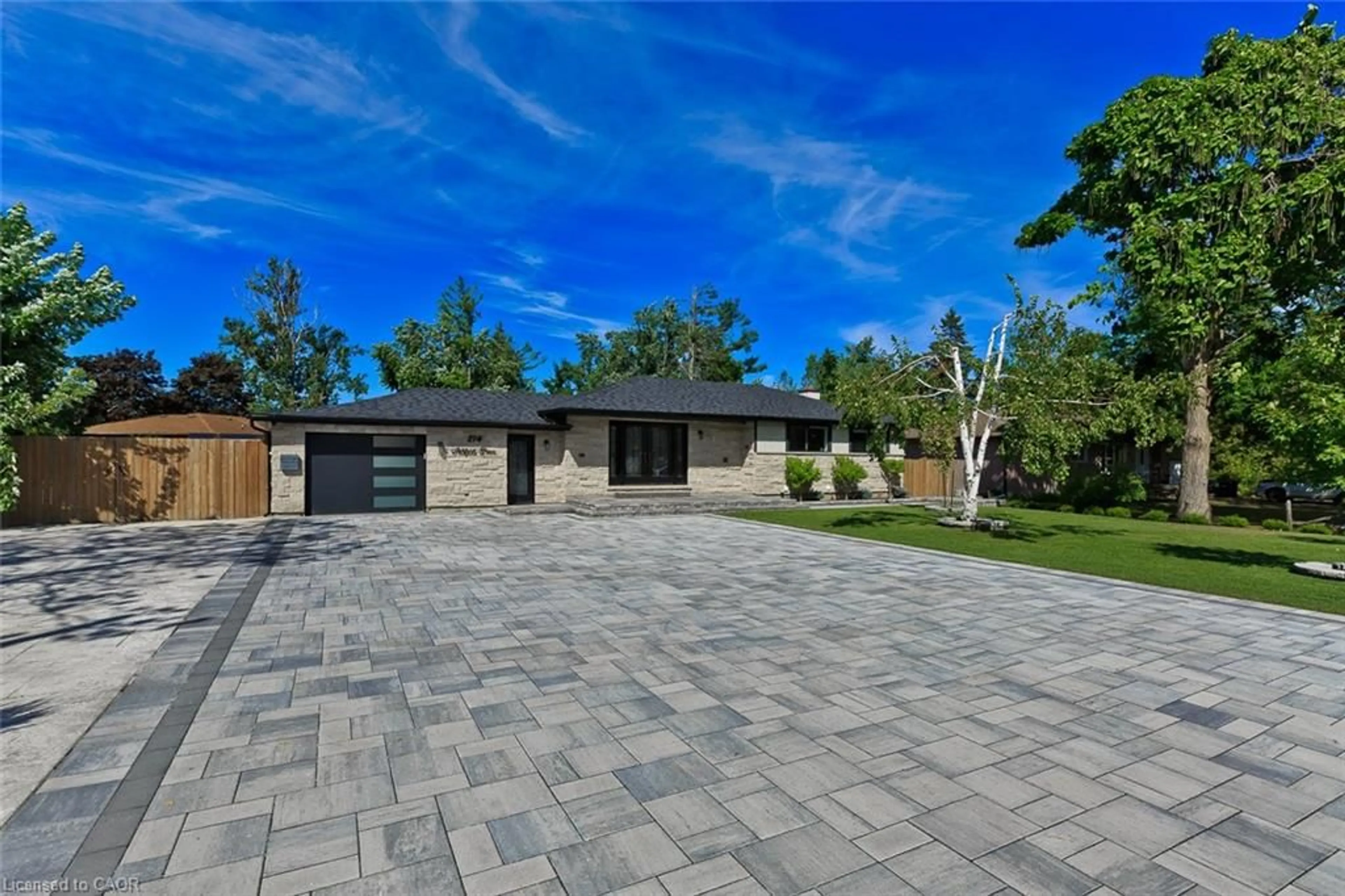 Home with brick exterior material, street for 214 Ashford Dr, Barrie Ontario L4N 4H3