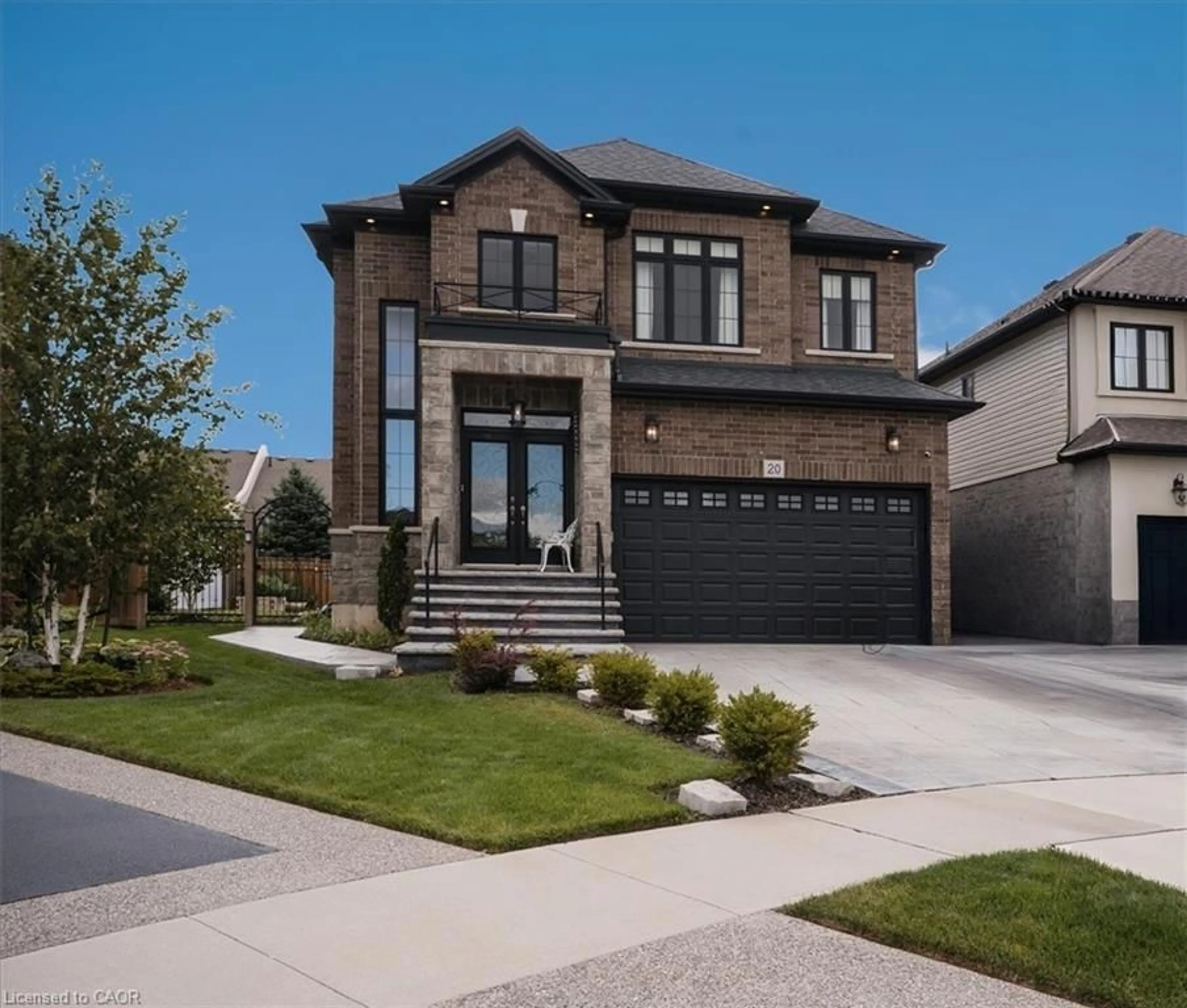 Home with brick exterior material, street for 20 Festival Way, Binbrook Ontario L0R 1C0
