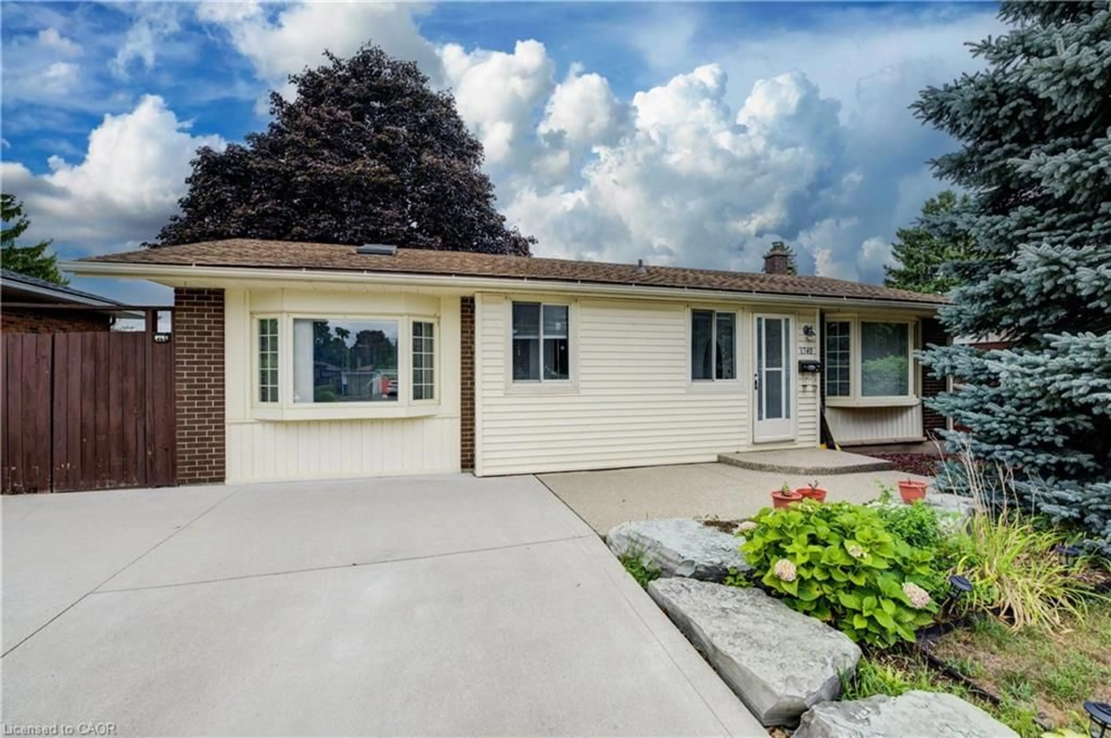 Home with vinyl exterior material, street for 1740 Holley Cres, Cambridge Ontario N3H 2S5
