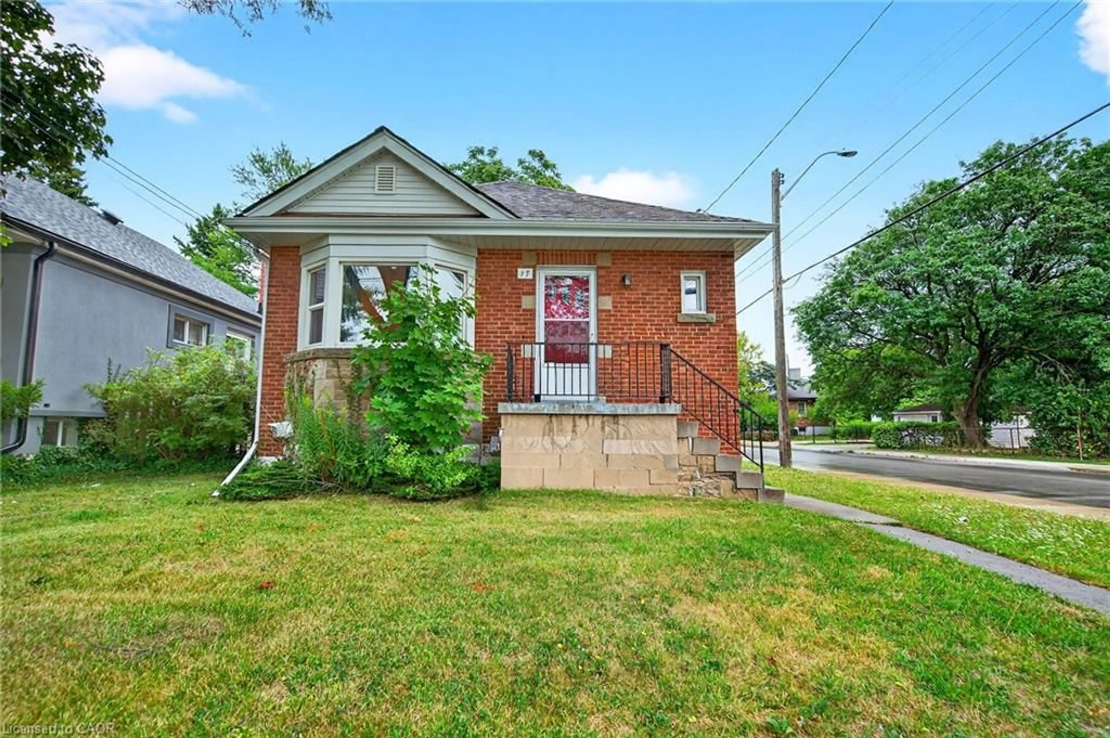 Home with brick exterior material, street for 17 West 3rd St, Hamilton Ontario L9C 3J5