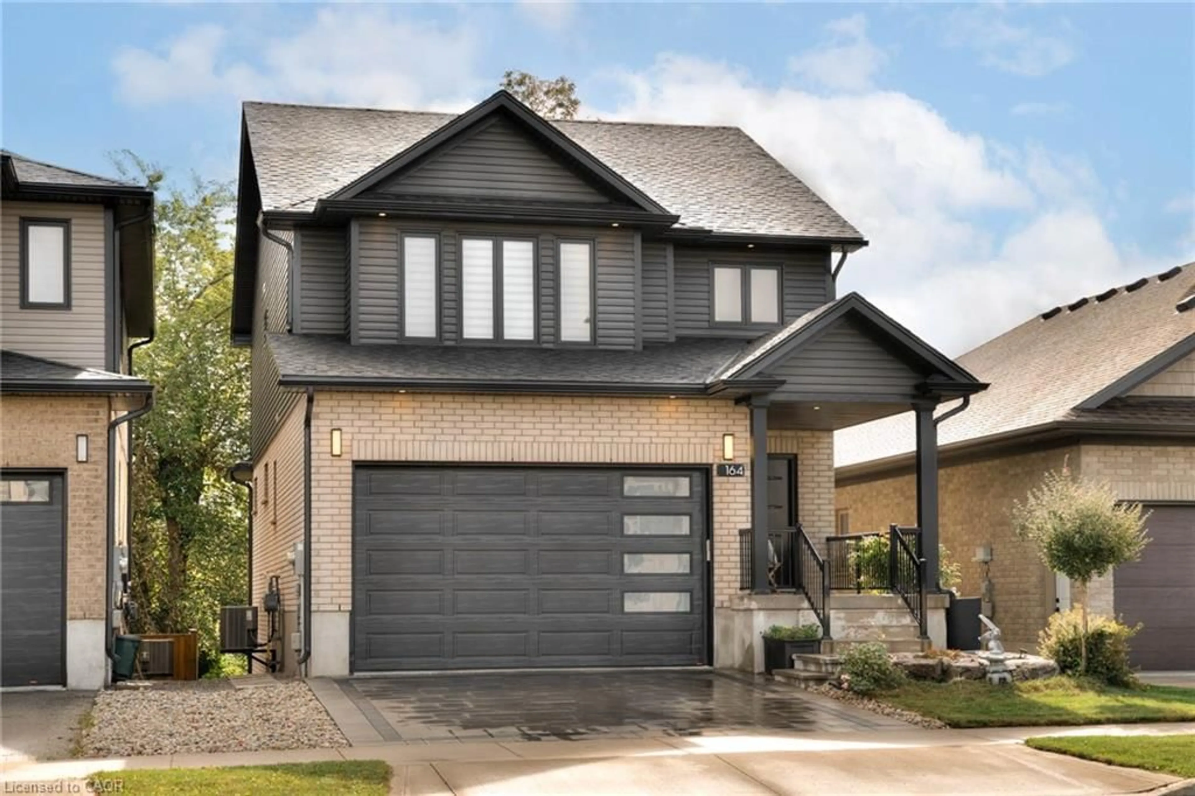 Home with brick exterior material, street for 164 Timber Trail Rd, Elmira Ontario N3B 0E3