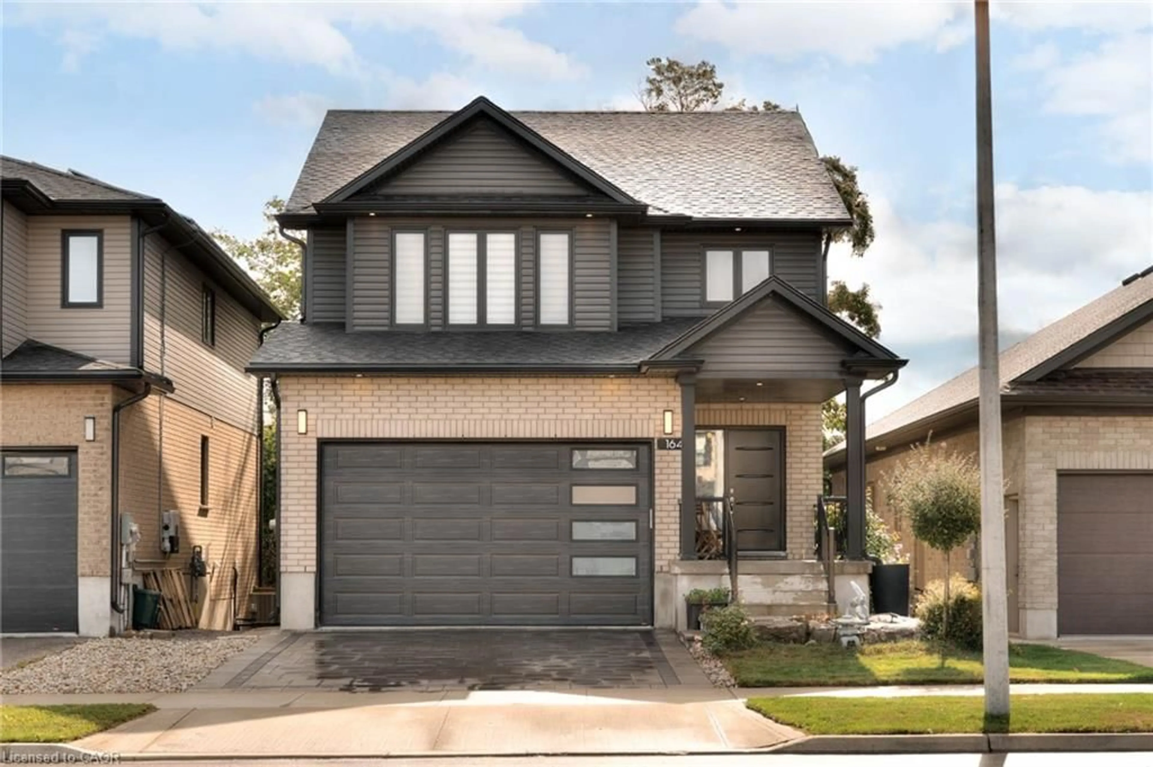 Home with brick exterior material, street for 164 Timber Trail Rd, Elmira Ontario N3B 0E3