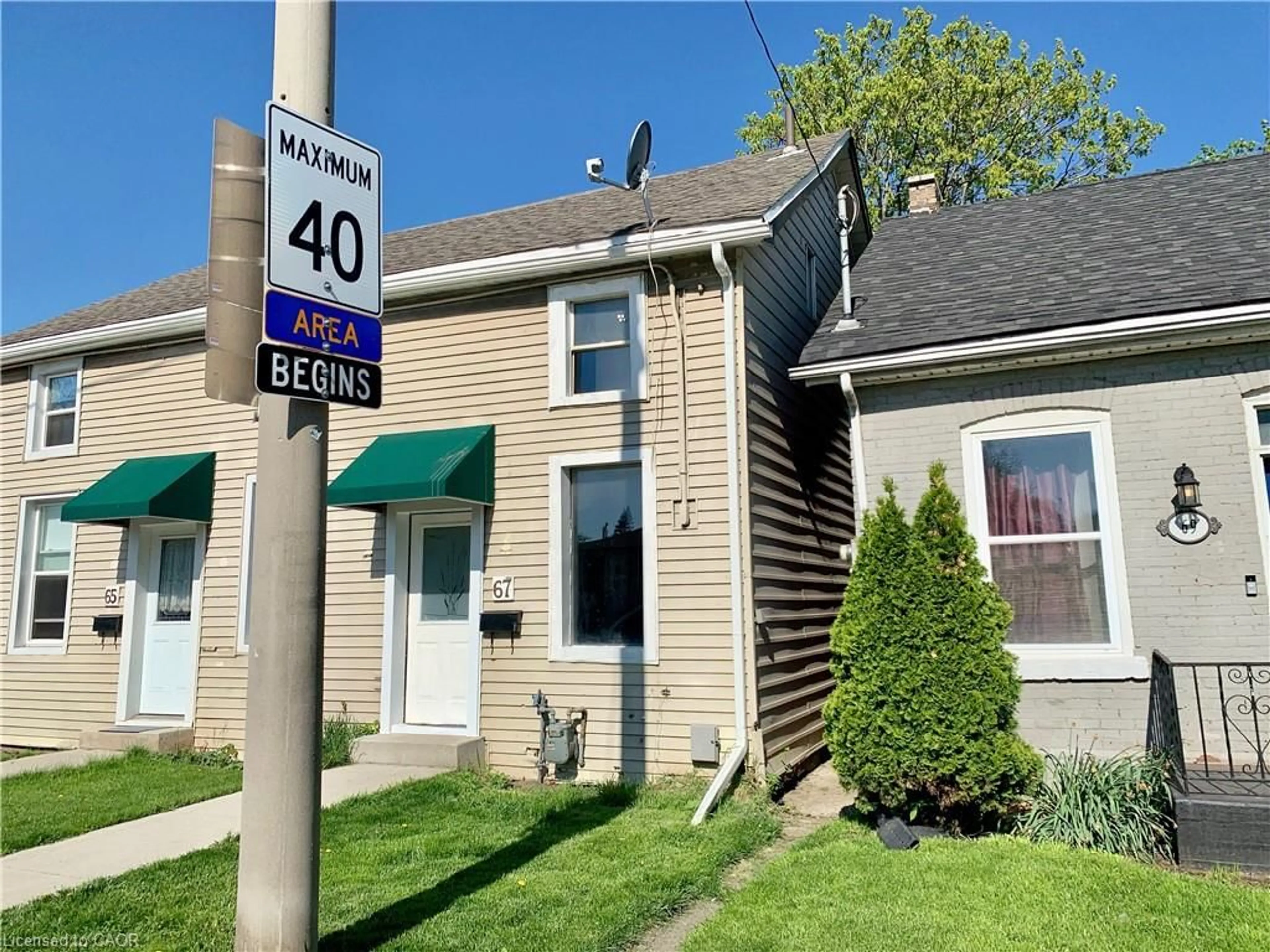 Home with vinyl exterior material, street for 67 Tisdale St, Hamilton Ontario L8L 5M3