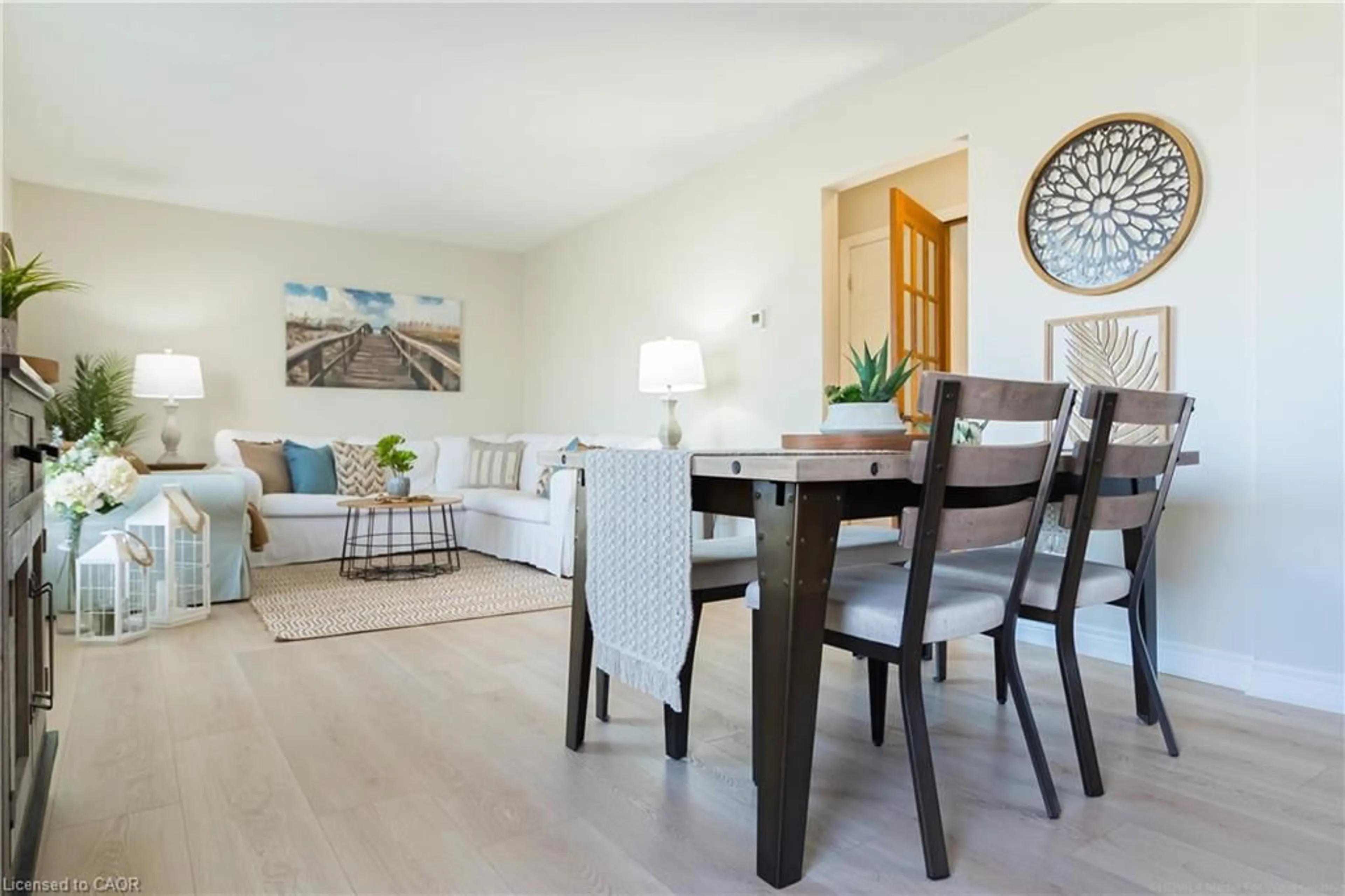 Living room with furniture, wood/laminate floor for 1343 Janina Blvd, Burlington Ontario L7P 1K5