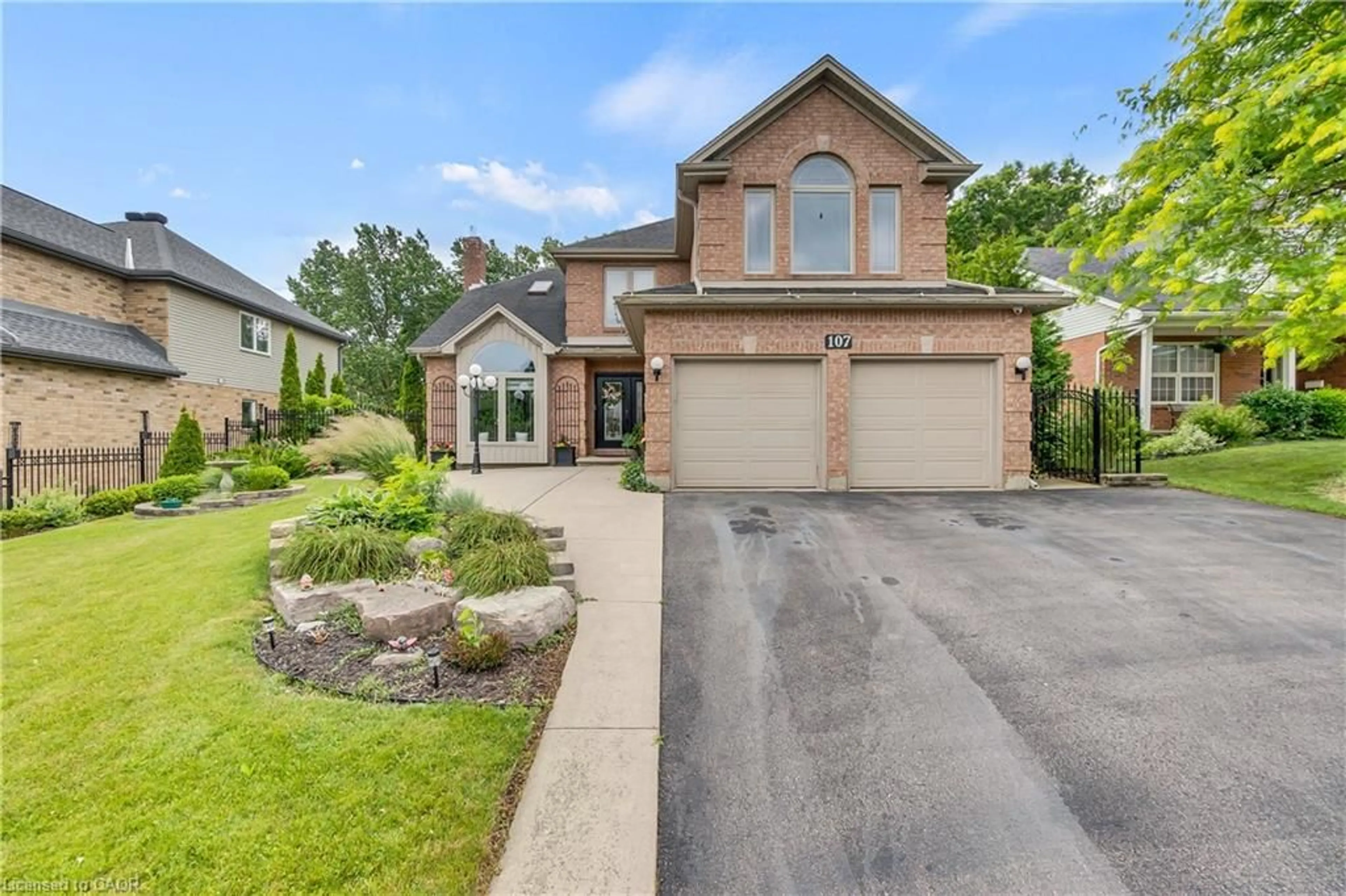 Home with brick exterior material, street for 107 Chandos Dr, Kitchener Ontario N2A 3Z4