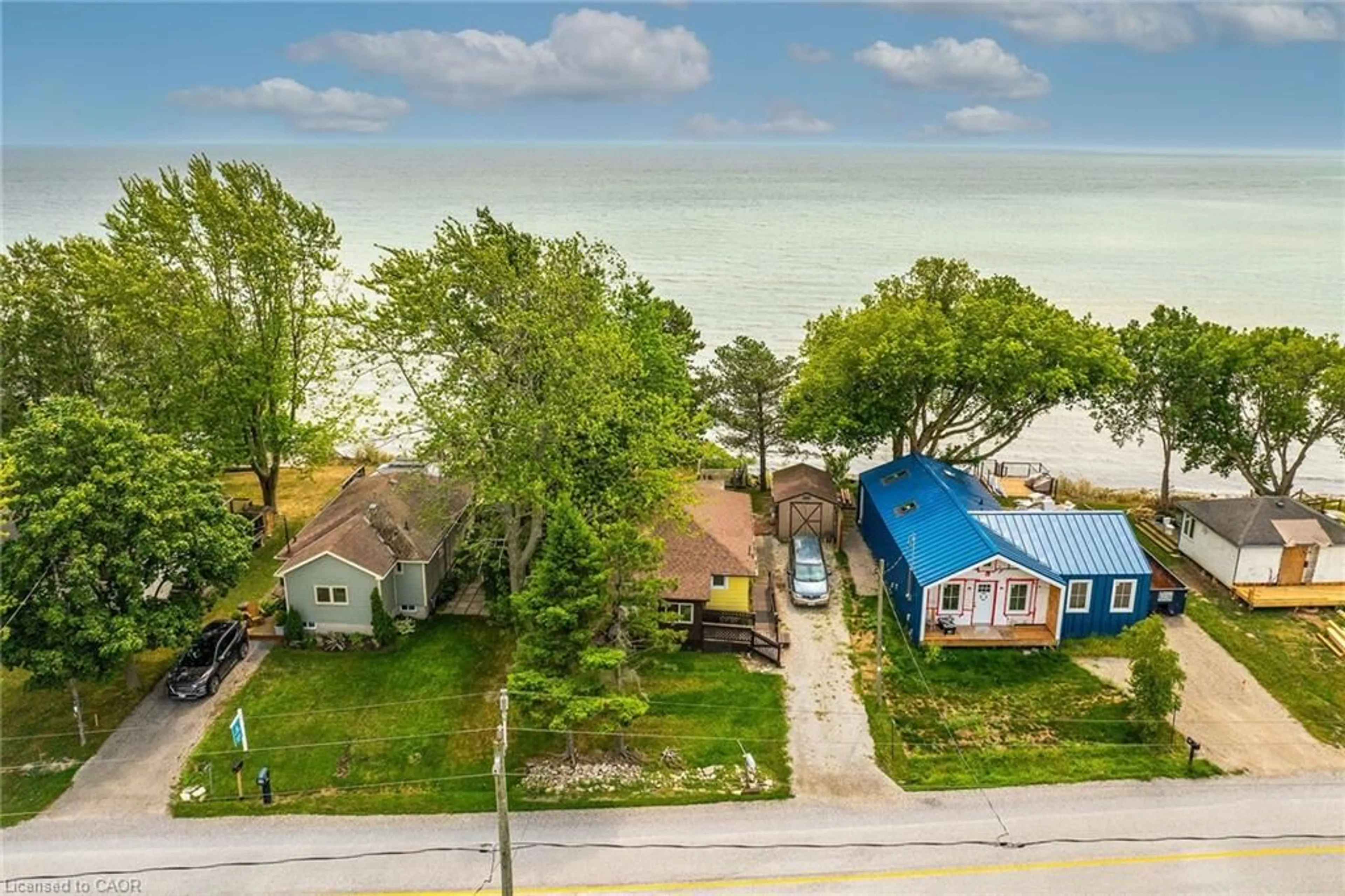 A pic from outside/outdoor area/front of a property/back of a property/a pic from drone, street for 966 South Coast Dr, Nanticoke Ontario N0A 1L0