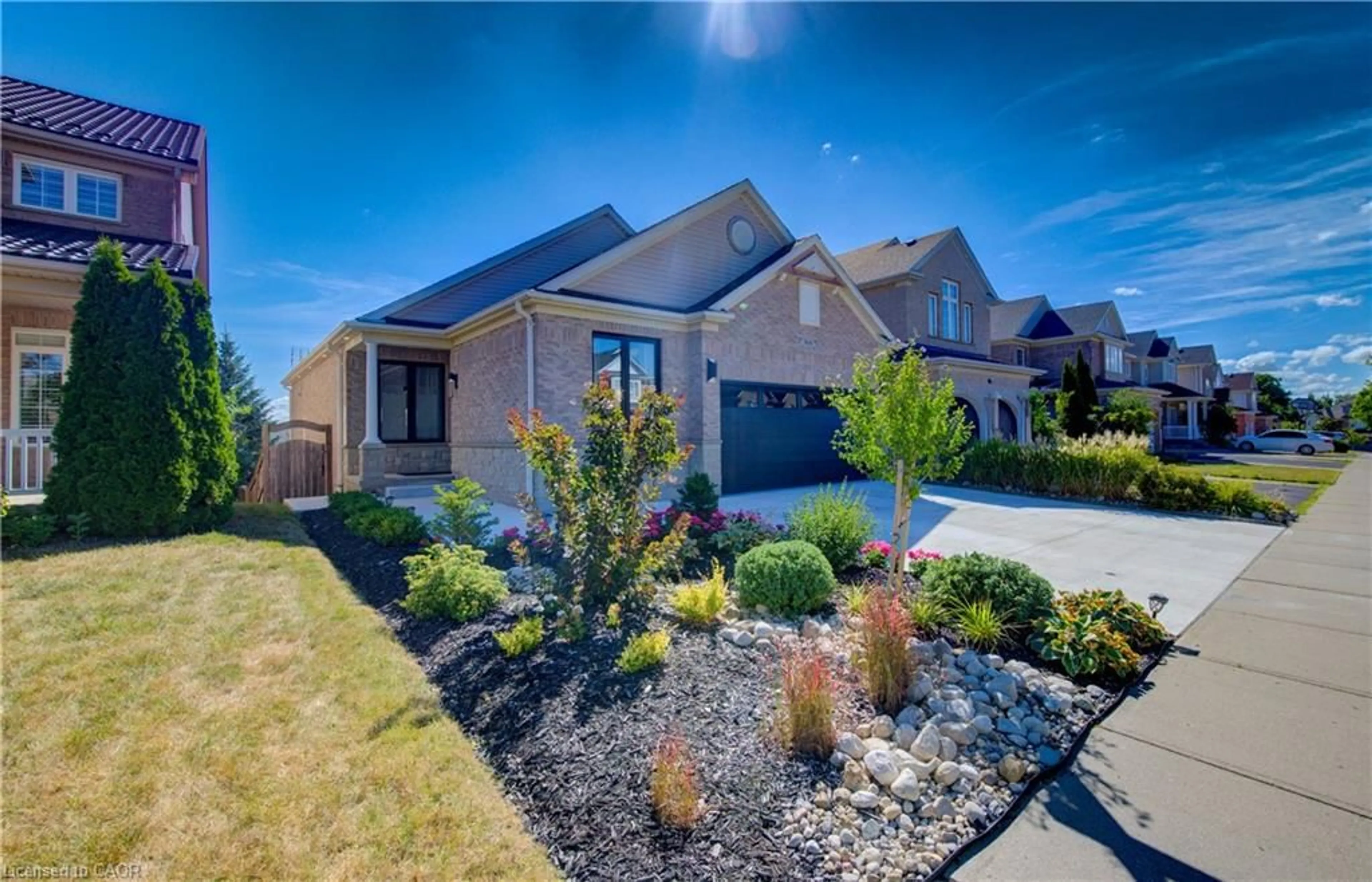Home with brick exterior material, street for 366 Pine Valley Dr, Kitchener Ontario N2P 2V4