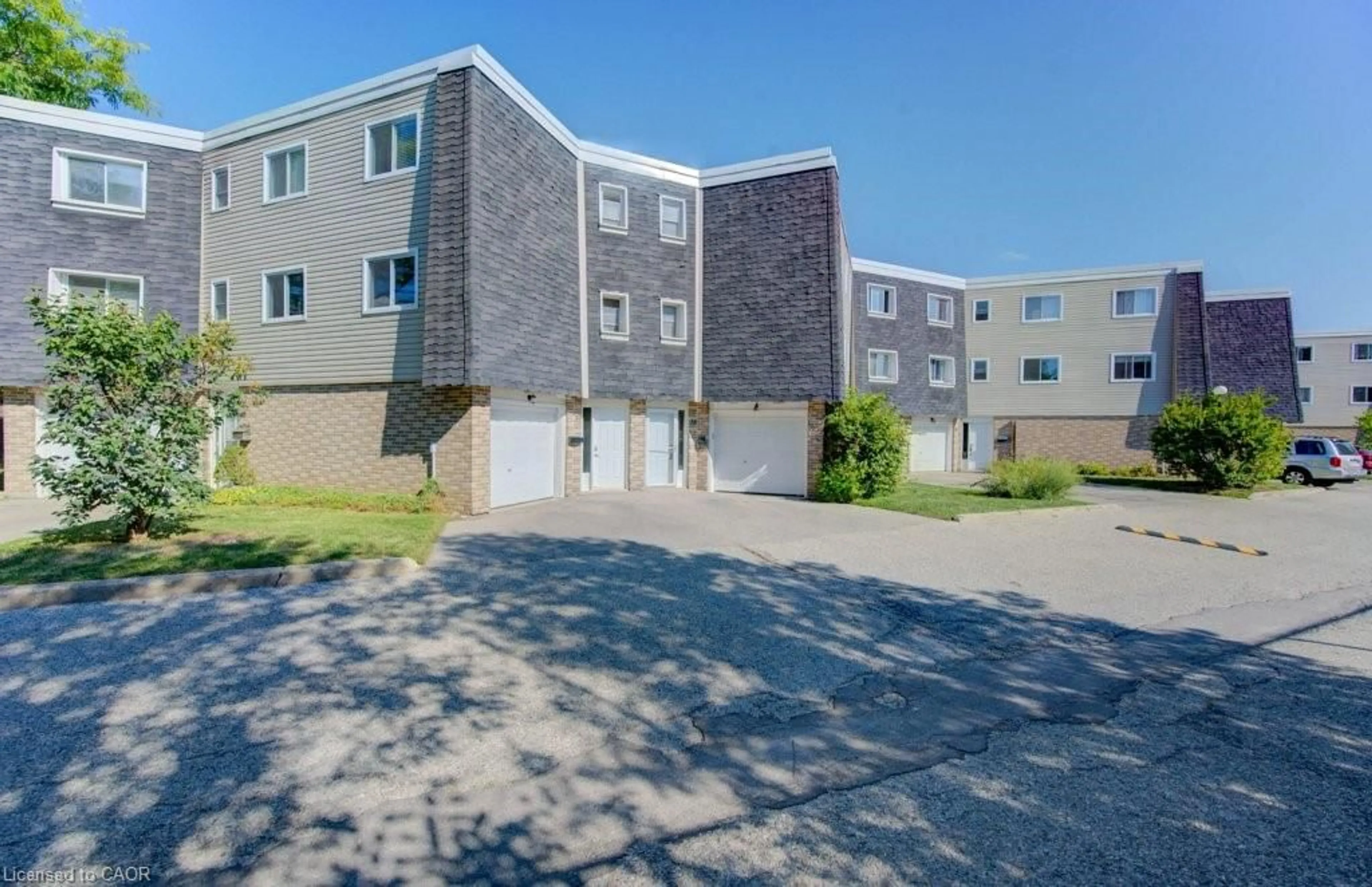 A pic from outside/outdoor area/front of a property/back of a property/a pic from drone, street for 60 Elmsdale Dr #38, Kitchener Ontario N2E 2G4