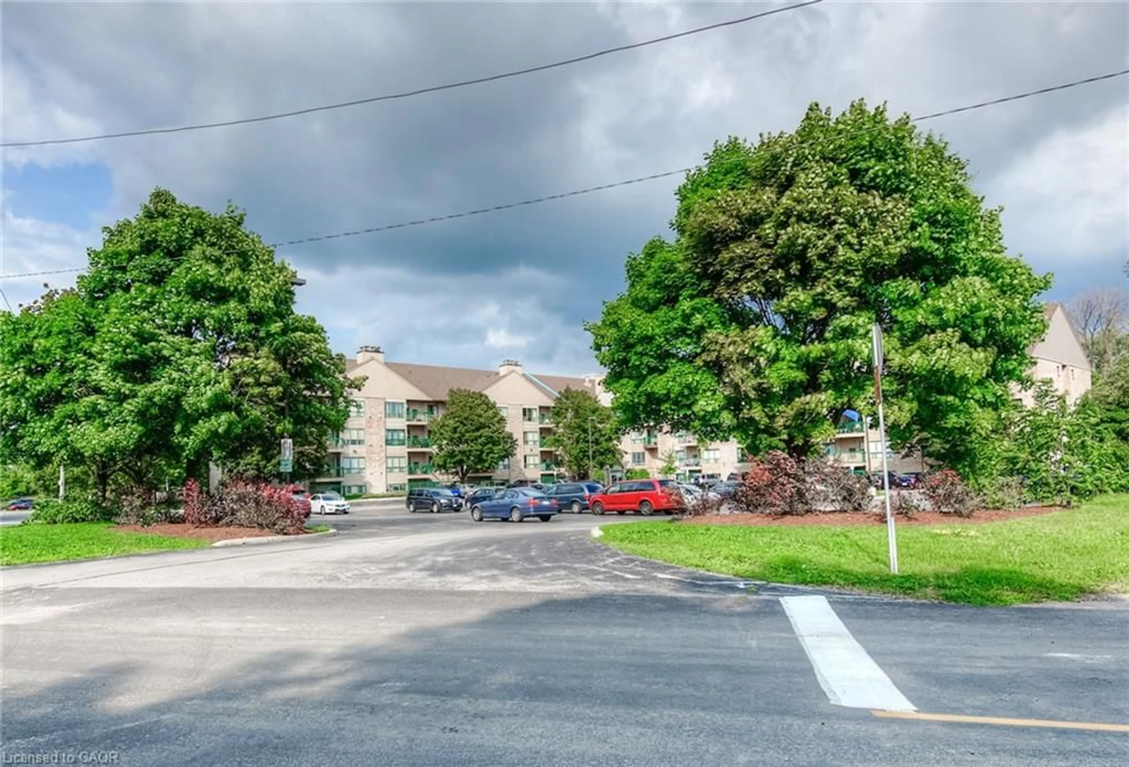 A pic from outside/outdoor area/front of a property/back of a property/a pic from drone, street for 15 Hofstetter Ave #213, Kitchener Ontario N2A 3Z7