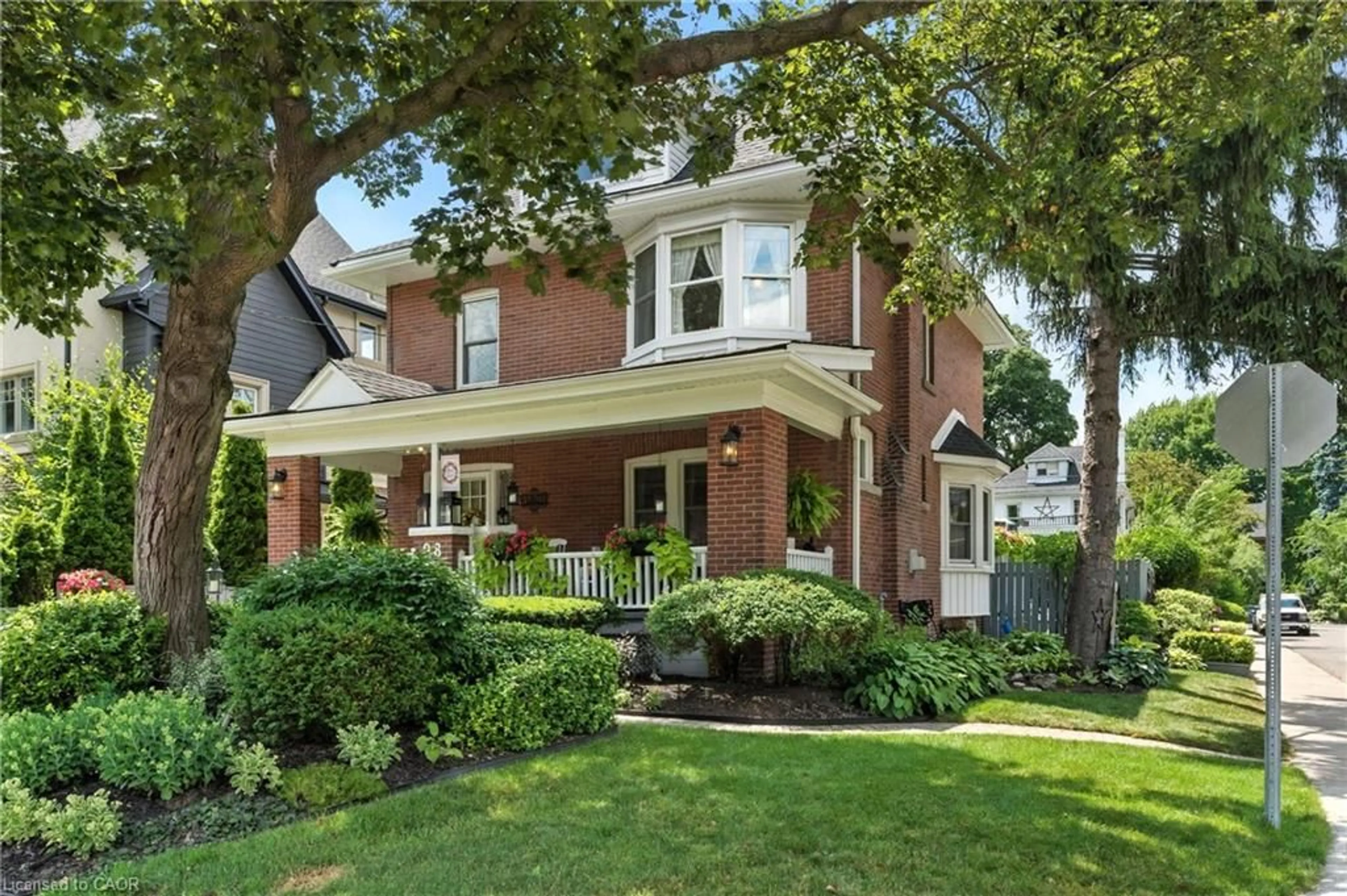 Home with brick exterior material, street for 98 Kensington Ave, Hamilton Ontario L8M 3H3