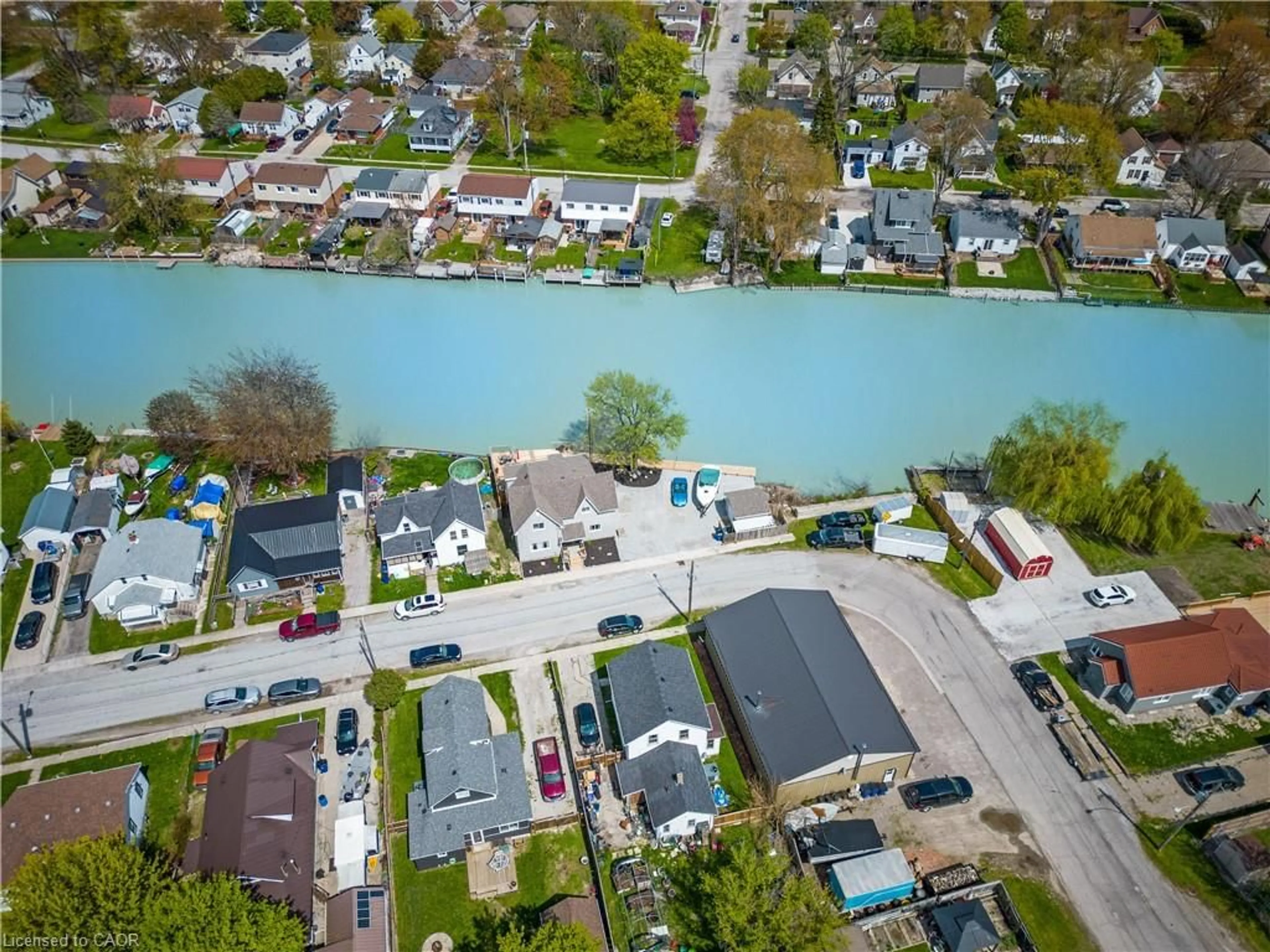 A pic from outside/outdoor area/front of a property/back of a property/a pic from drone, water/lake/river/ocean view for 310 Emily St, Wallaceburg Ontario N8A 4K3