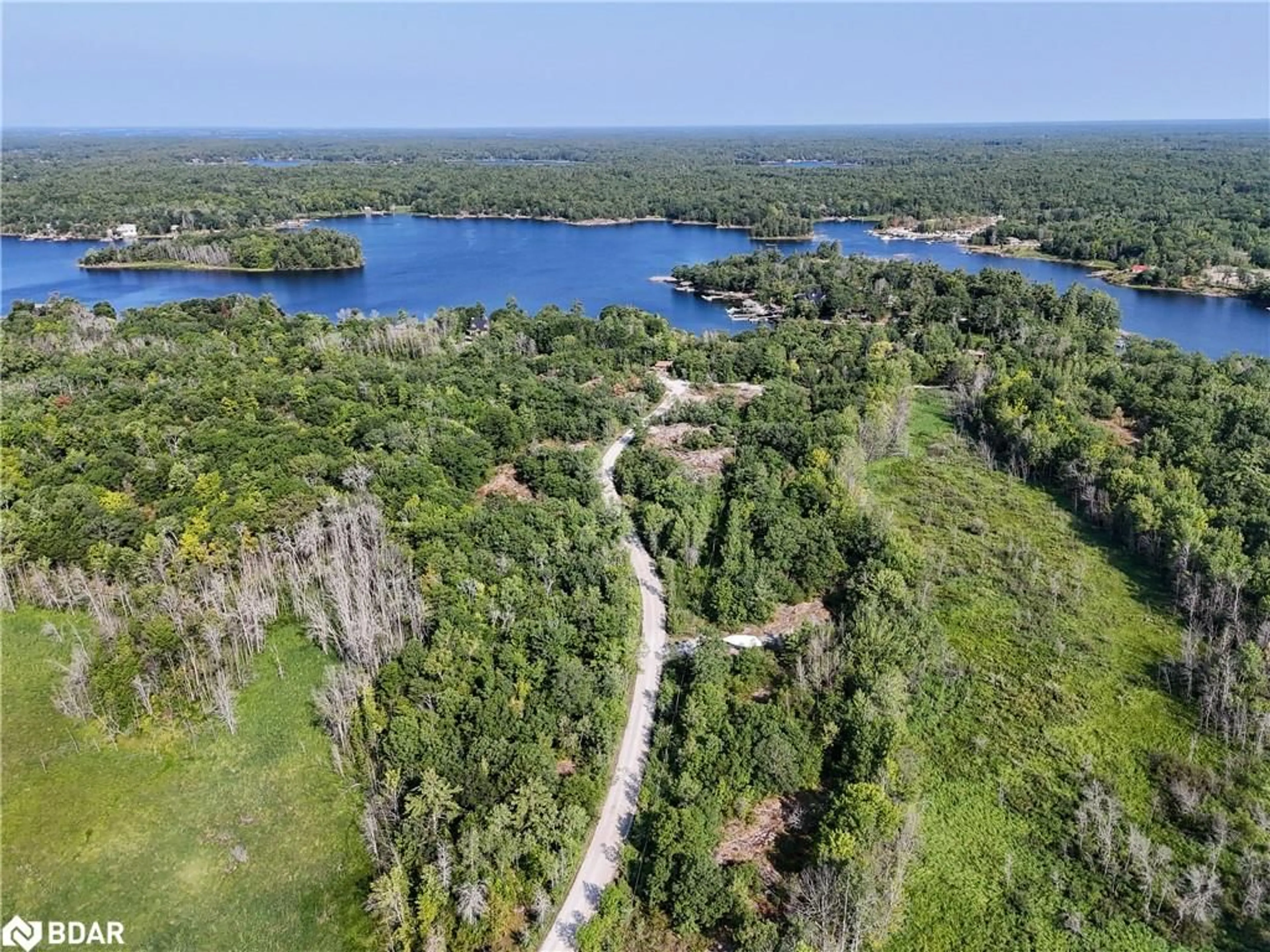 A pic from outside/outdoor area/front of a property/back of a property/a pic from drone, water/lake/river/ocean view for 30 Birch Acres Dr, Port Severn Ontario L0K 1S0