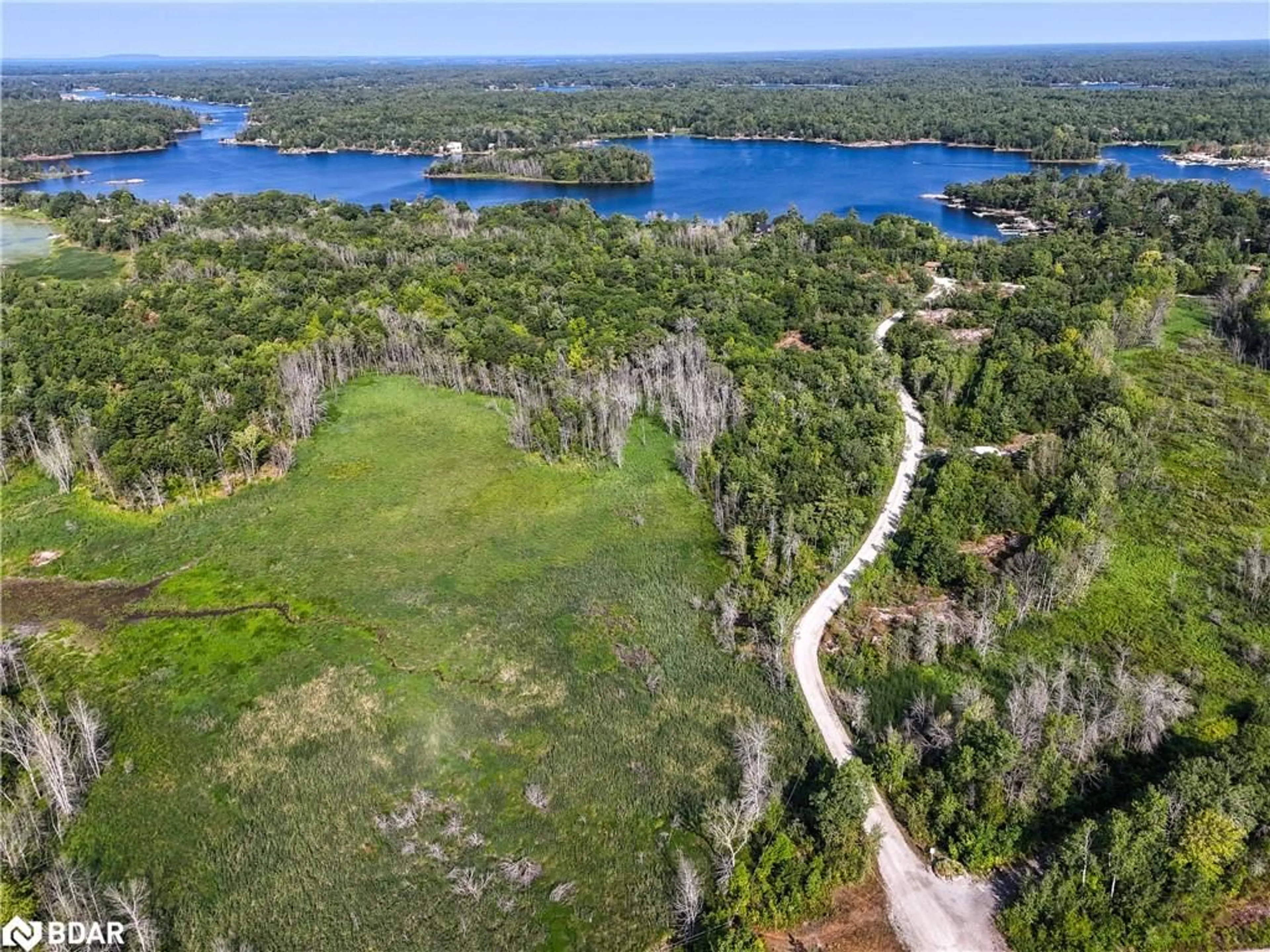 A pic from outside/outdoor area/front of a property/back of a property/a pic from drone, water/lake/river/ocean view for 30 Birch Acres Dr, Port Severn Ontario L0K 1S0